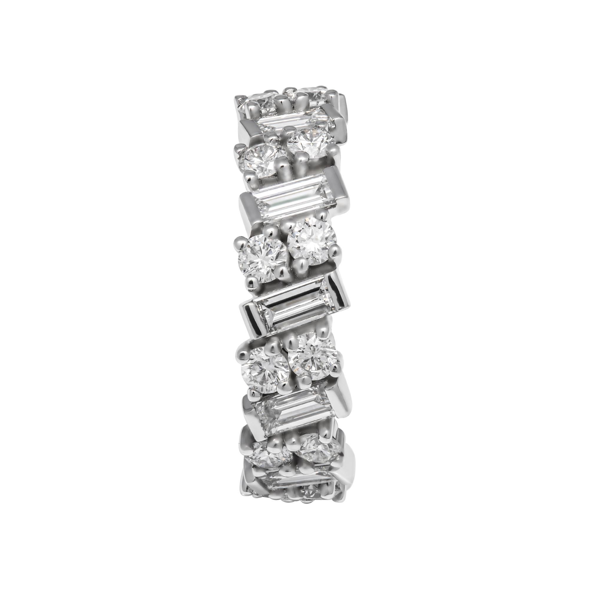 Diamond Band In Platinum 950
Beautiful and Timeless piece of Jewelry! Trend of this season,
Mounted in Platinum with almost 22 full cut Round diamonds & 11 Baguette Diamonds F-G color, VVS, totaling 2.35ct - Making a full circle of endless sparkle,