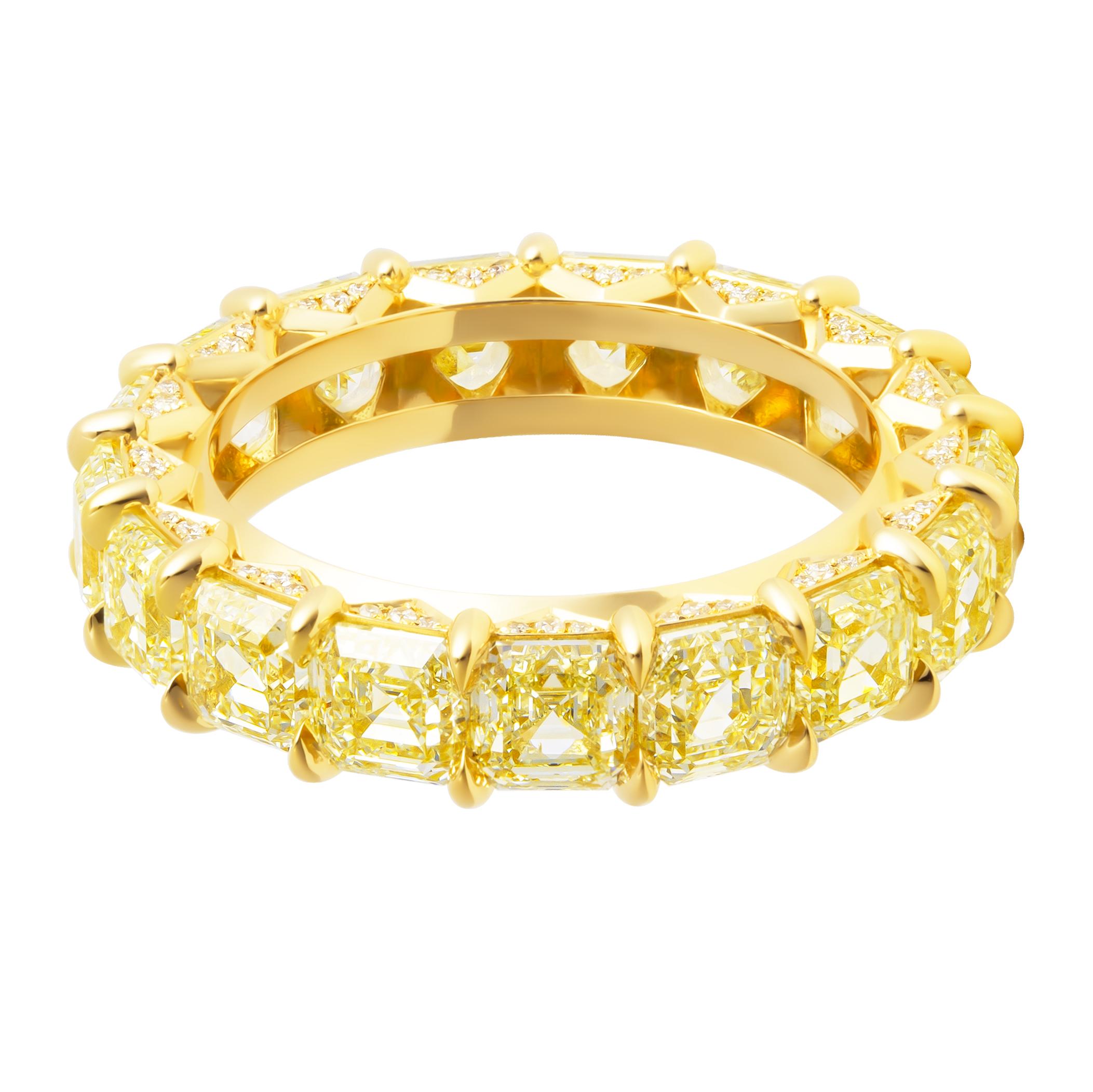 Eternity Band with Fancy Yellow Asscher Cut Diamonds 
In 18K Yellow Gold, encrusted with pave on the side, totaling 0.16ct
17 stones 0.45ct each Fancy Yellow Assher Cut Diamonds totaling 7.73ct 
Size: 6+
