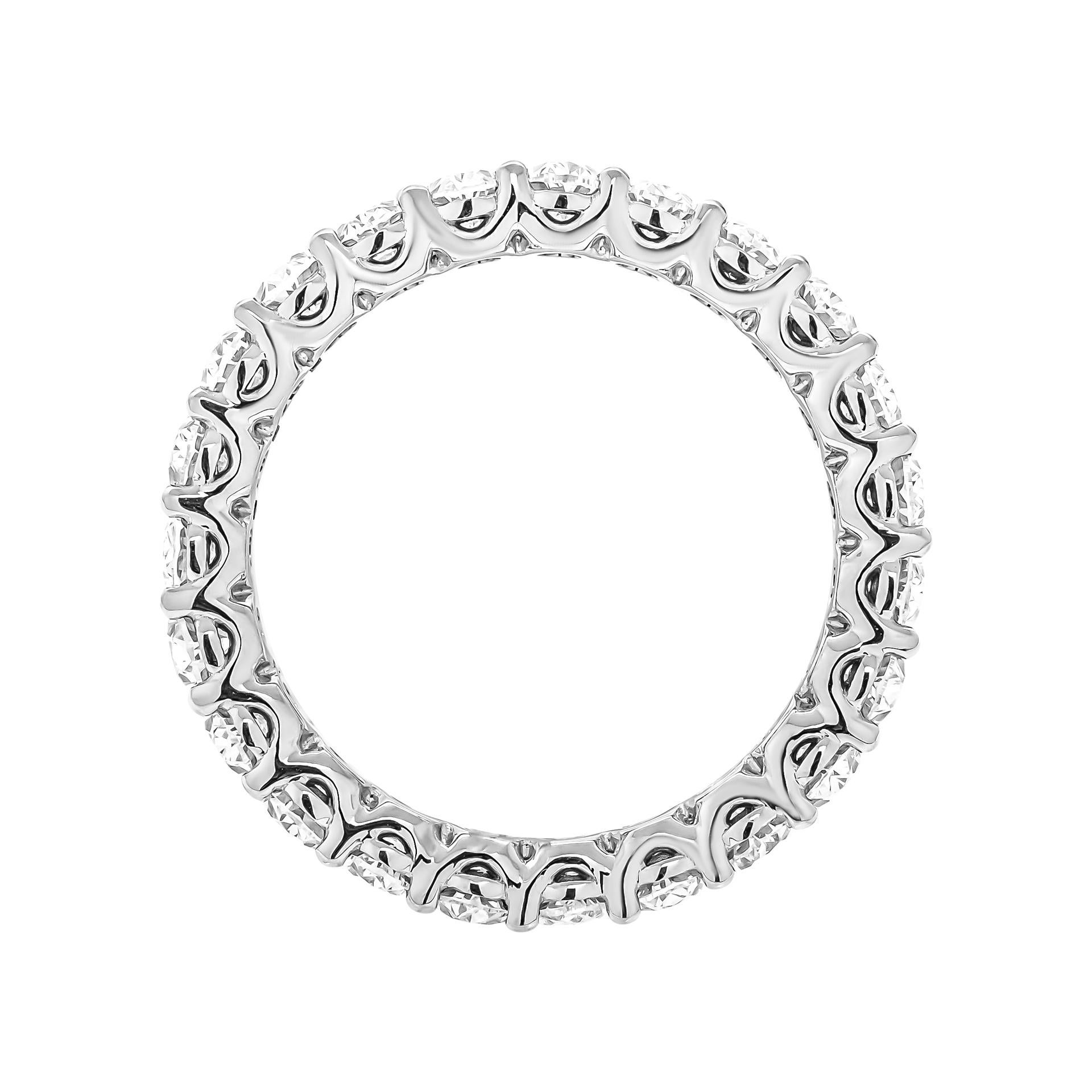 Eternity Wedding band in 14K White Gold with Oval Diamonds
23 stones totaling 3.10ct (0.13ct each) G/H color VS clarity 
Size: 6 ½ 
