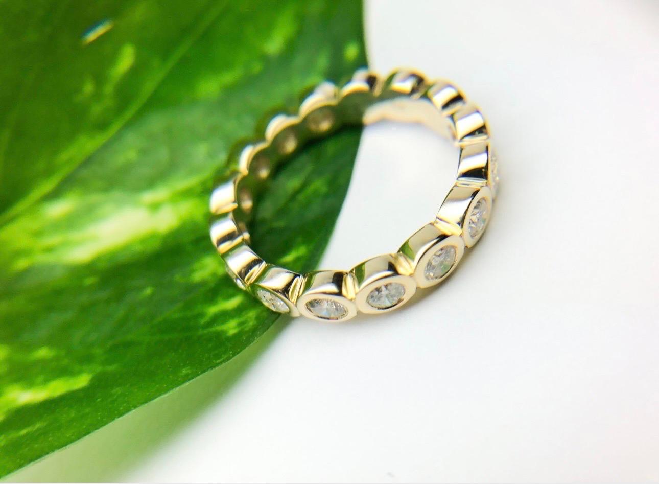 Large bezel eternity diamond ring made in 18KT yellow gold, nice and sturdy! The diamonds are totaling 2.50 carats and are VS-SI clarity and F-G color. The ring is simple and well made!

Certificate of authenticity comes with purchase!

ABOUT US
We