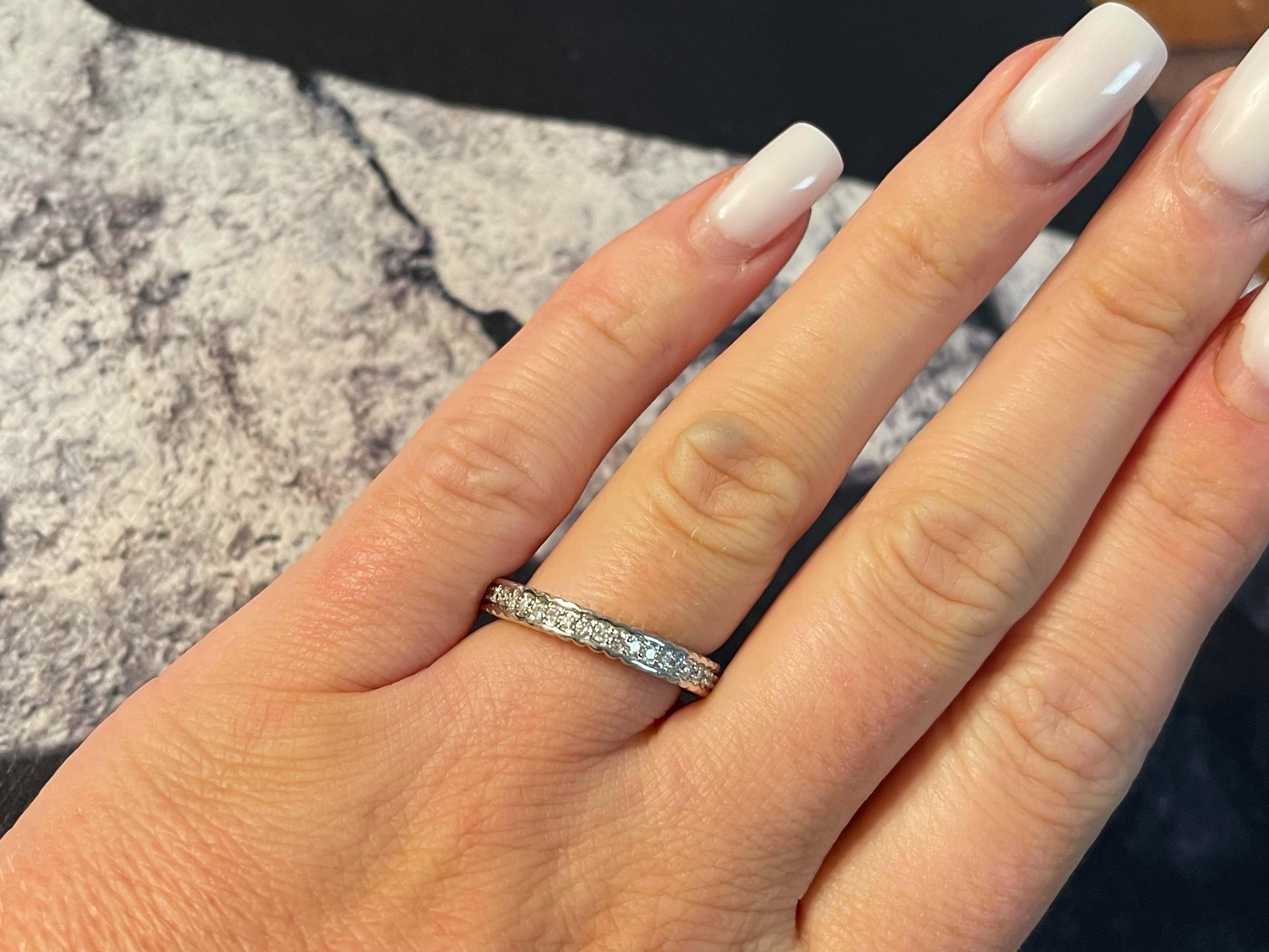 Item Specifications:

Metal: 18k White Gold

Diamond Count: 46 brilliant cut

Total Diamond Carat Weight: 0.55 carats 

Diamond Color: G-H

Diamond Clarity: SI

Ring Size: 6.5

Total Weight: 5.2 Grams

Stamped: 