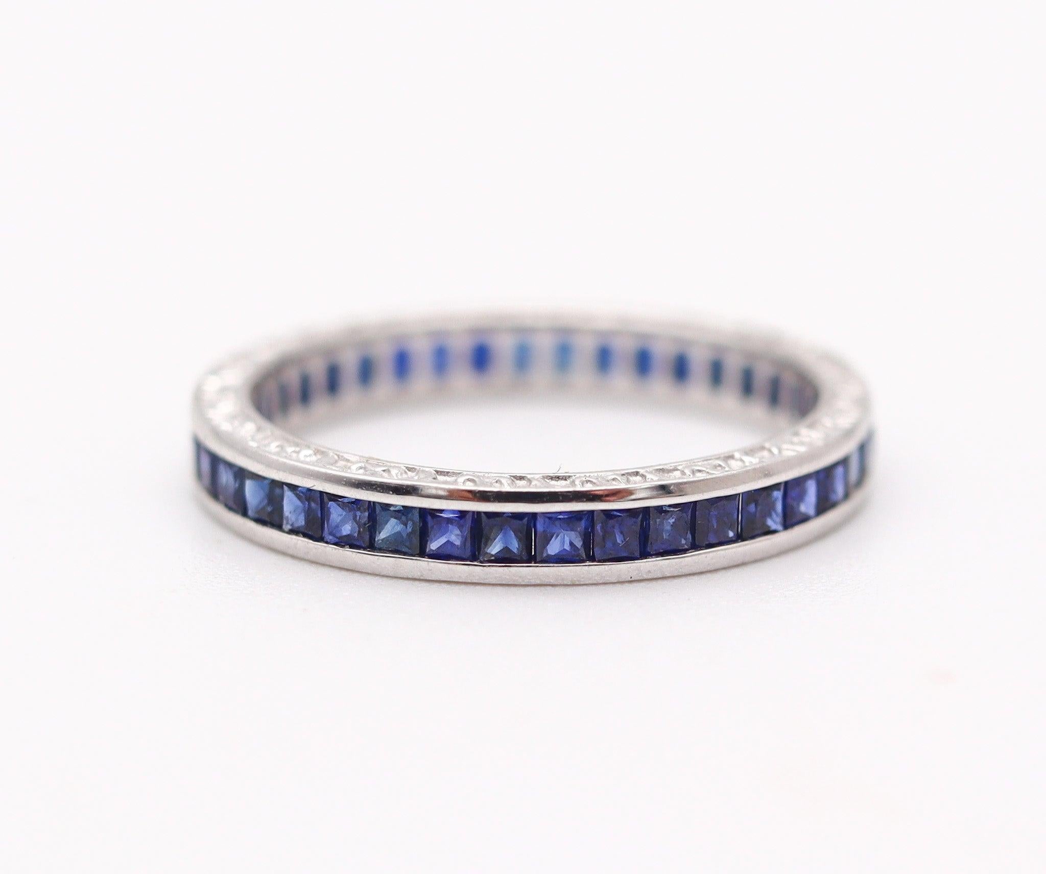 Modernist ETERNITY Channel Ring Band In 14Kt White Gold & 1.23 Ctw In Vivid Blue Sapphires For Sale
