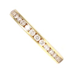 Eternity Channel Set Diamond Band Ring in 18 Karat Yellow Gold