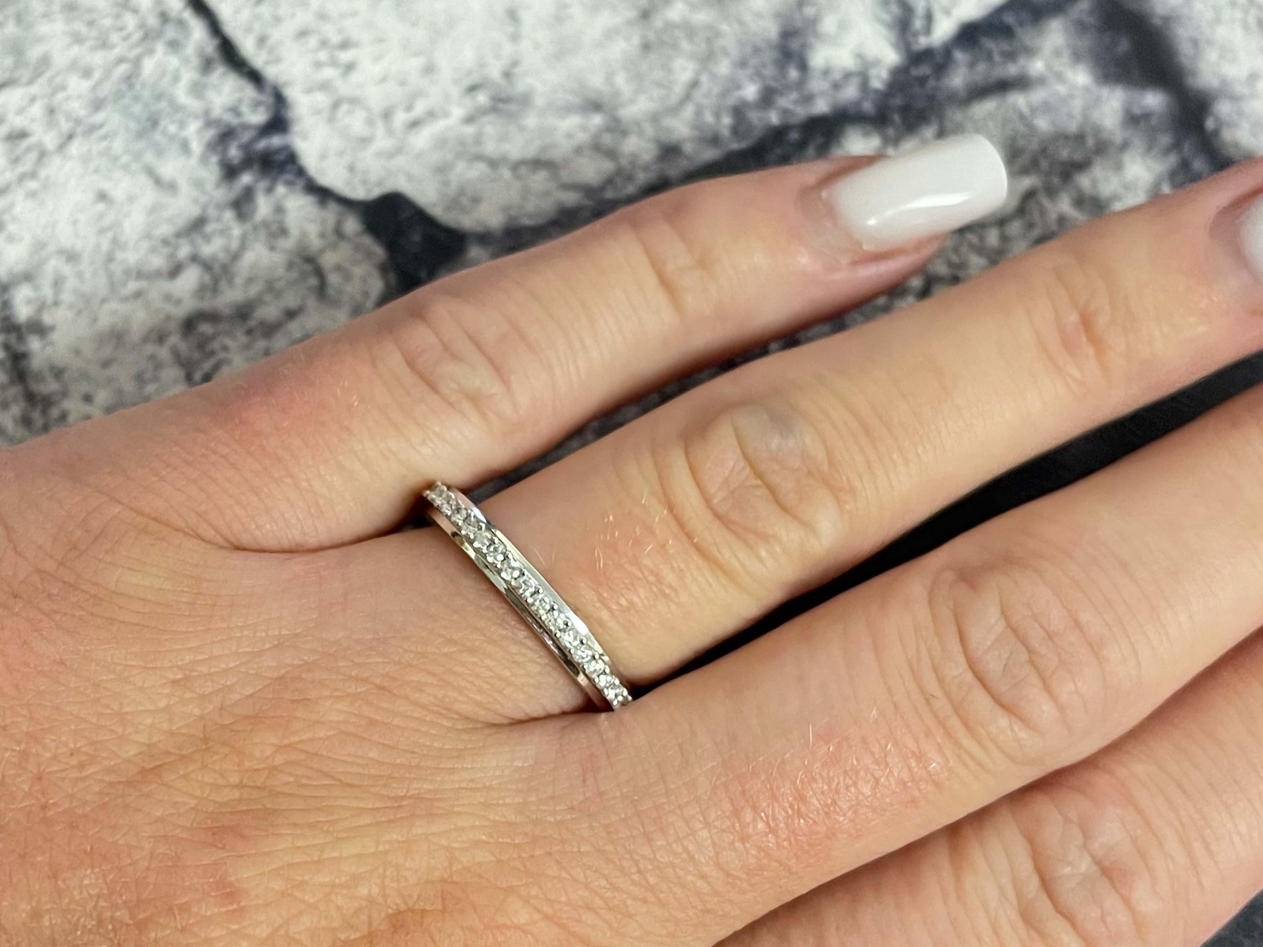 Item Specifications:

Metal: 18k White Gold

Diamond Count: 45 brilliant cut

Total Diamond Carat Weight: 0.50 carats 

Diamond Color: G-H

Diamond Clarity: SI

Ring Size: 6.5

Total Weight: 3.4 Grams

Stamped: 