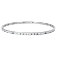 Eternity diamond bangle in white gold signed 'Vertin' with diamonds