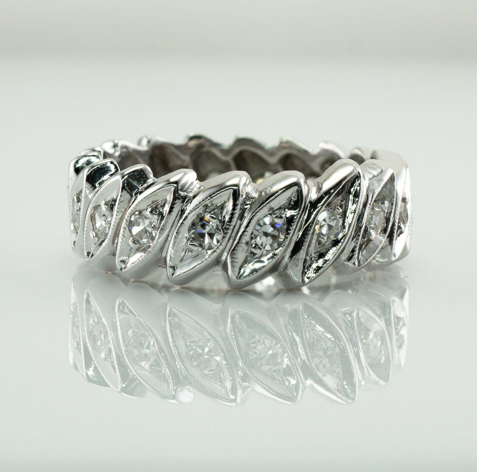 Eternity Diamond Ring 14K White Gold Band Single Cut .90 TDW

This vintage eternity band is finely crafted in solid 14K White Gold (carefully tested and guaranteed). Eighteen single cut diamonds go all around, no beginning, no end. The diamonds are