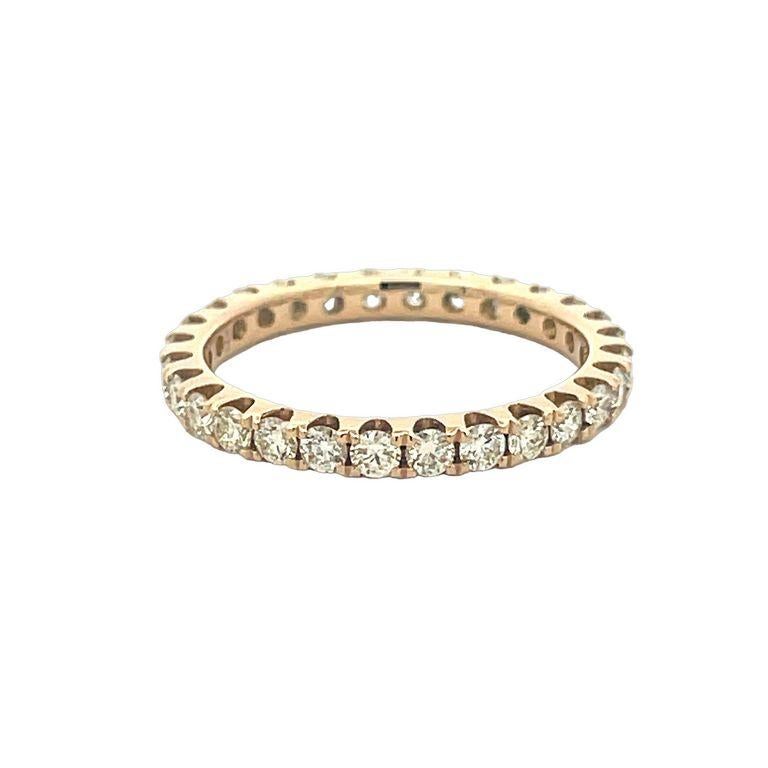 We are thrilled to introduce to you our latest diamond round-shaped eternity band. This band is unique because of the perfect balance between the diamonds itself. This band features a total of 1.25 carat weight. The band is made of 14K yellow gold