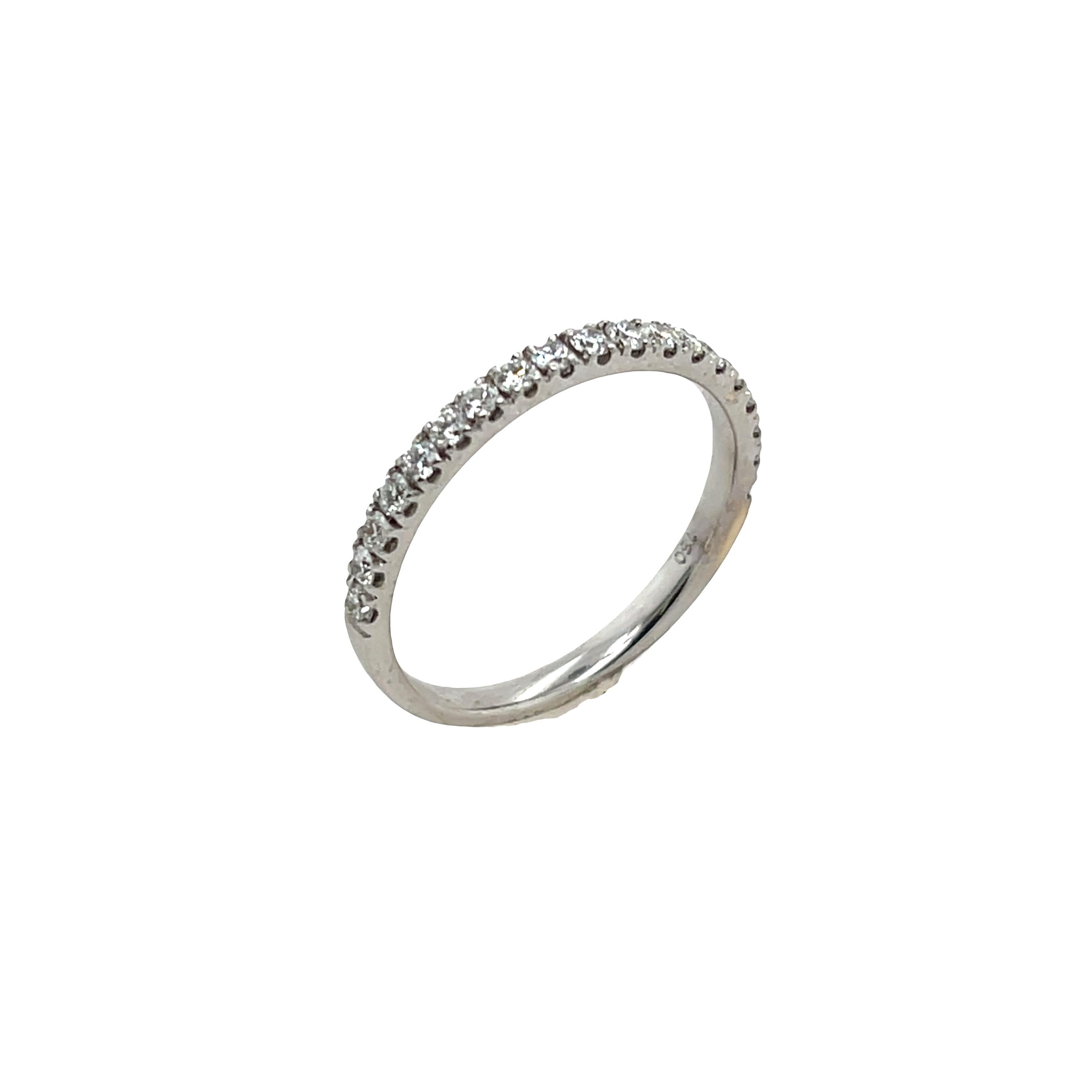 This diamond half eternity band is set with 0.35ct round brilliant cut diamonds.
This ring is elegant and beautiful for wedding ring, set in 18ct white gold.
Total Diamond Weight: 0.35ct 
Diamond Colour: H
Diamond Clarity: SI1
Width of Band: 1.90mm