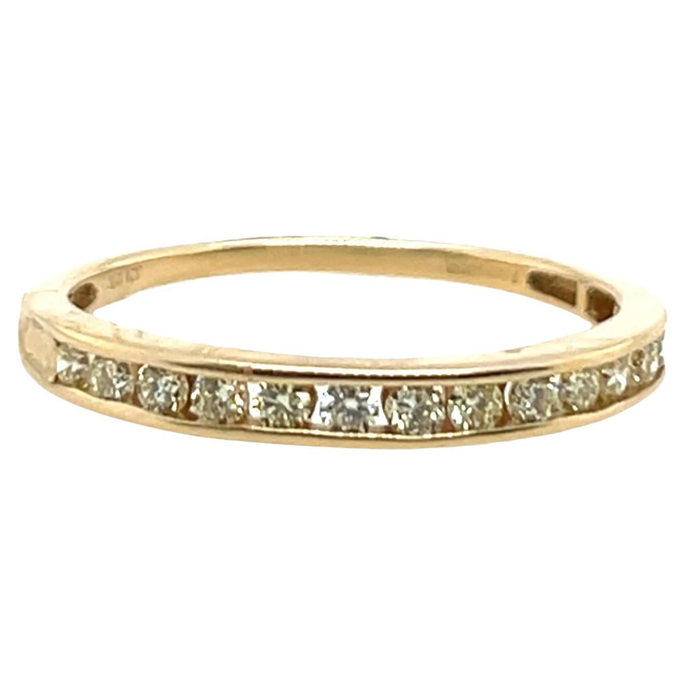 Bague d
éternité en or jaune 14 ct sertie de 0,40 ct de diamants