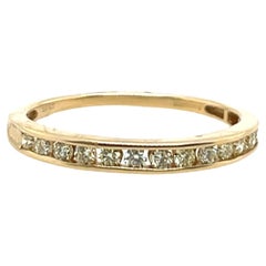 Bague d
éternité en or jaune 14 ct sertie de 0,40 ct de diamants