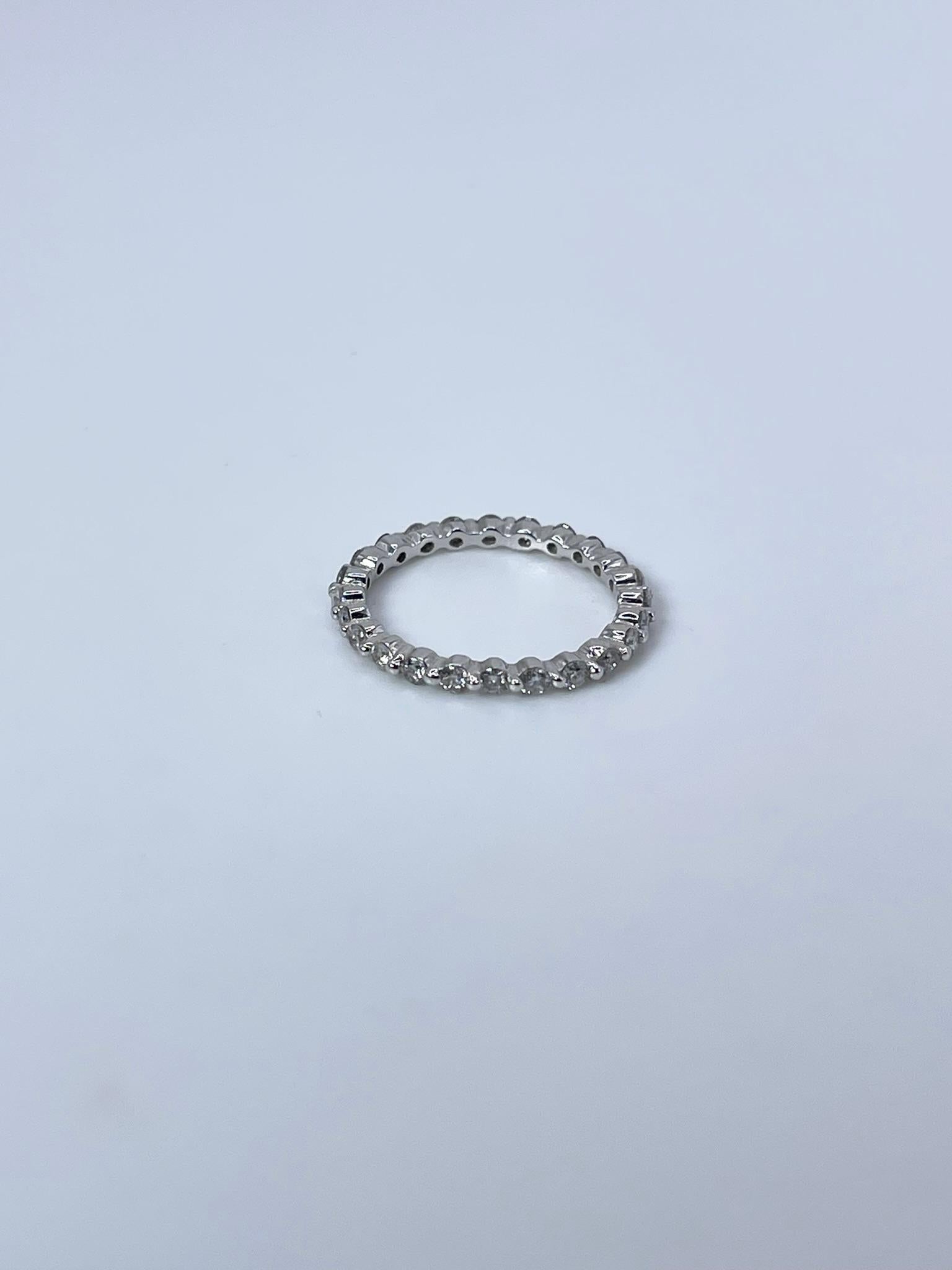 Diamond ring made eternity style, cannot be re-sized.
ITEM#: KEK120-00018
GRAM WEIGHT: 1.46gr
METAL: 18KT

NATURAL DIAMOND(S)
Cut: Round Brilliant
Color: G
Clarity: SI 
Carat: 0.59ct
Size: 5 ( cant be re-sized)


WHAT YOU GET AT STAMPAR