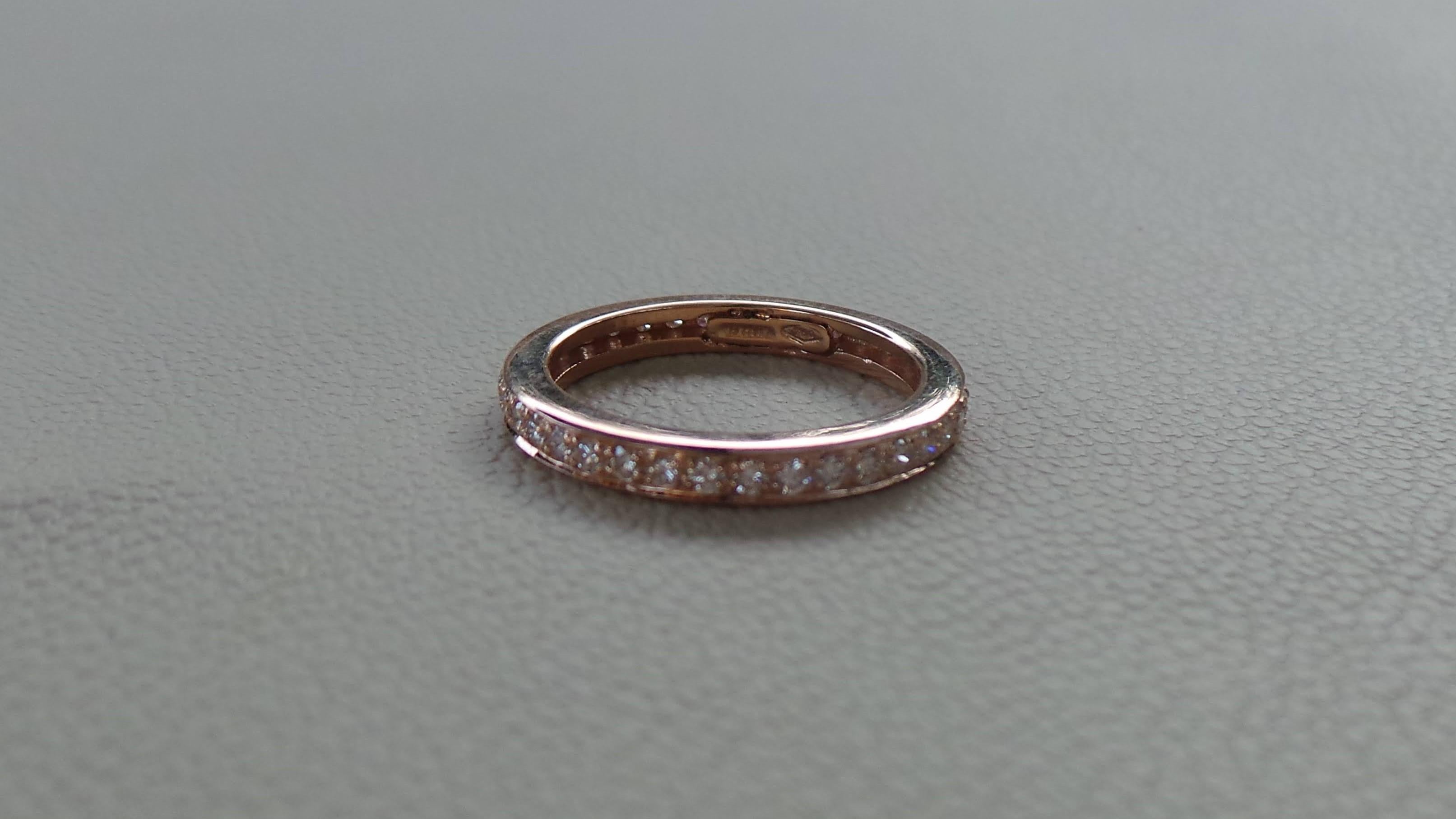 Andrea Macinai design a dedicated collection for stackable rings.  
The eternity ring has diamonds all the way around the band.
Round diamonds cut brillant total 0.45 carats.
We're a workshop so every piece is handmade, customizable and resizable.