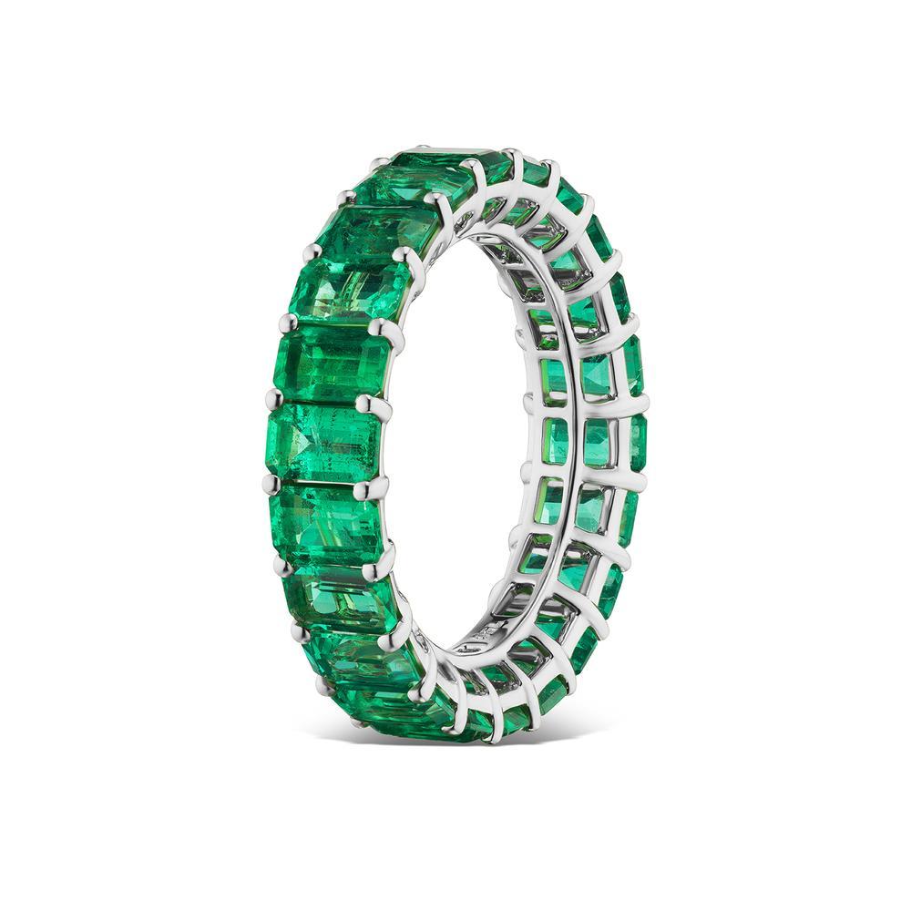 Modern Platinum 6.10 ct Eternity Emerald Band For Sale