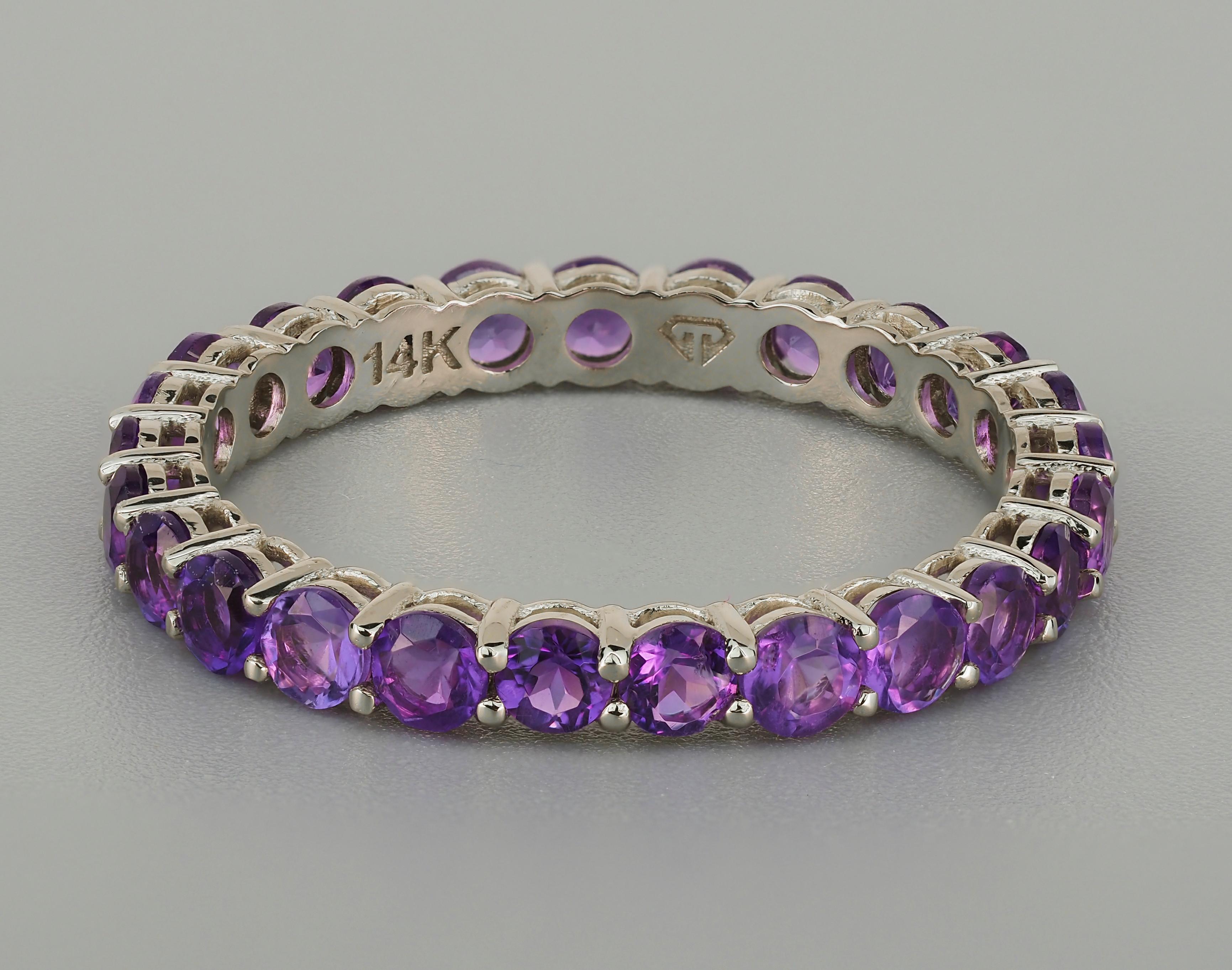 Eternity gold ring with amethysts. 

Round amethyst ring. Amethyst gold ring. Stackable eternity ring. Casual amethyst ring. 

Metal: 14k gold
Weight: 2.25 g. depends from size

Set with amethysts.
Round shape, violet color, aprx 2.6 ct total (25