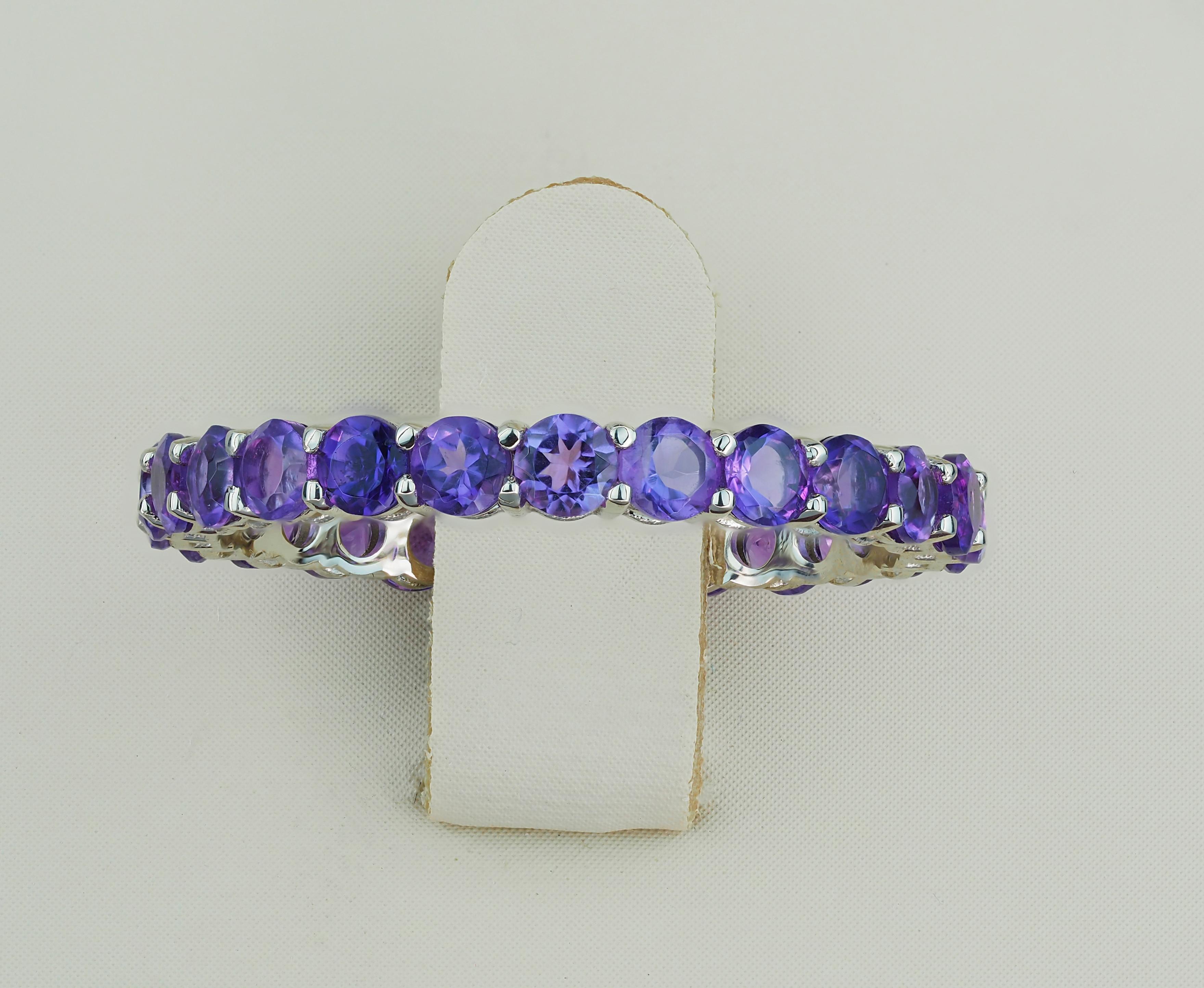 Women's Eternity gold ring with amethysts. 