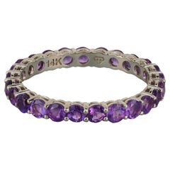 Eternity gold ring with amethysts. 