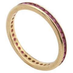 Eternity natural ruby ring in 18k gold, French wedding band