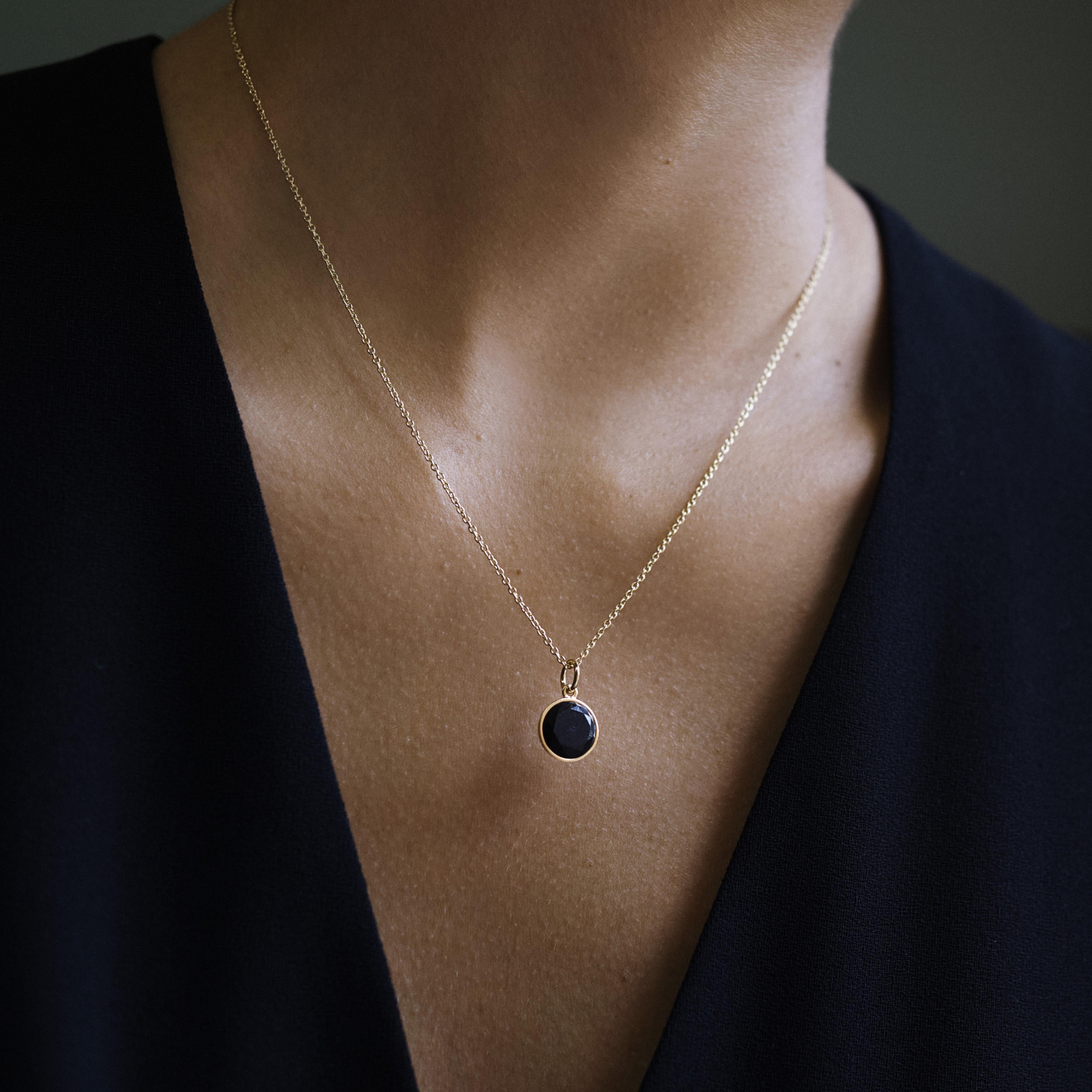 Also available in recycled sterling silver and combined with pendant.

The gorgeous ETERNITY pendant with our 45 cm chain in solid, recycled 18k gold. The pendant is set with a large brilliant-cut Mpingo Blackwood diamond.

Dimensions:
Length: 45 cm