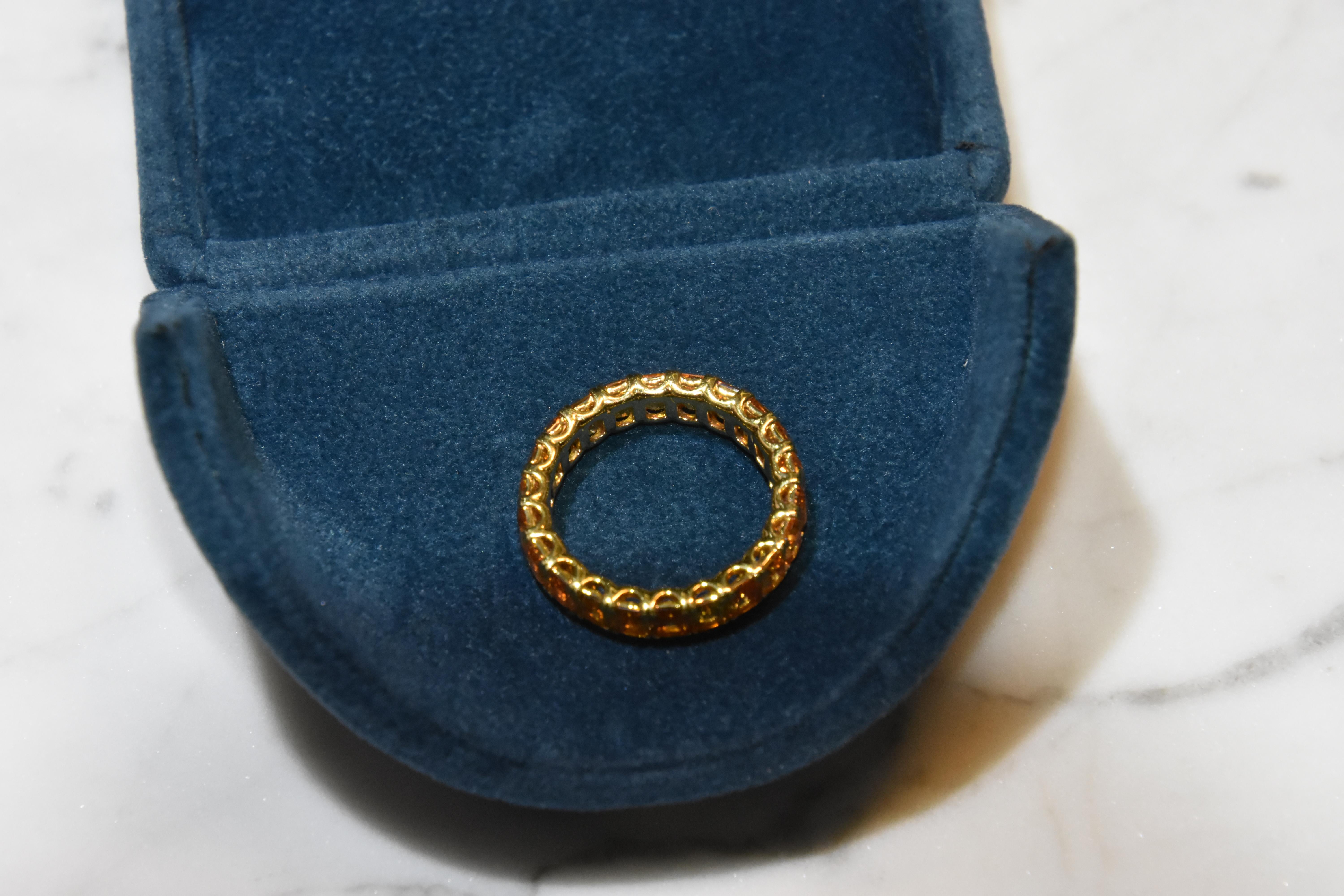 orange sapphire eternity ring