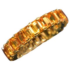 Eternity Orange Sapphire Ring in Yellow Gold
