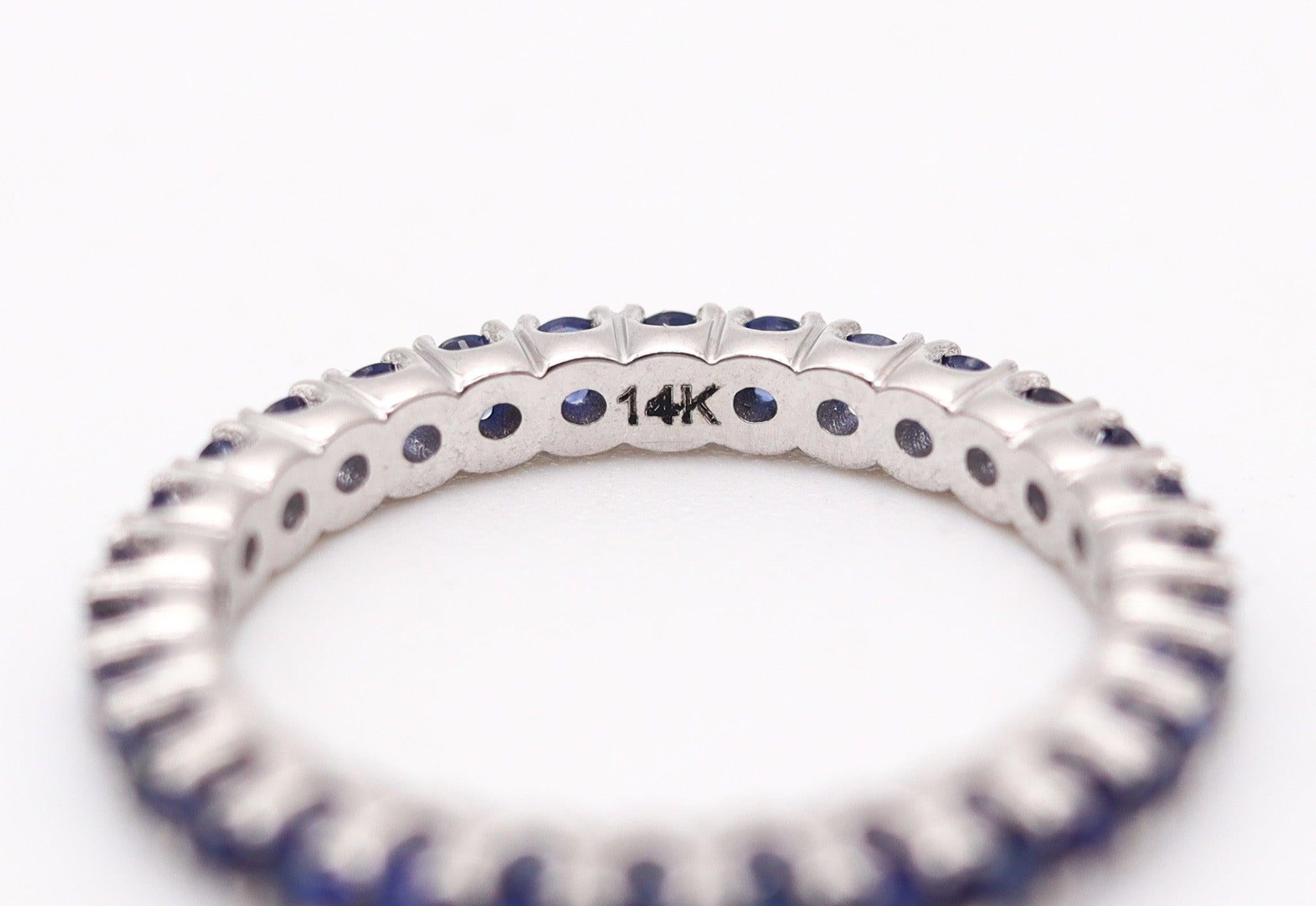 Round Cut ETERNITY Ring Band In 14Kt White Gold With 1.08 Ctw In Vivid Blue Sapphires For Sale