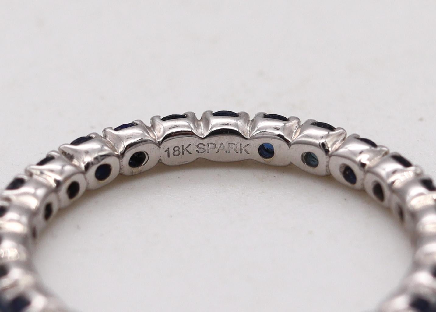 Modern Eternity Ring Band in 18Kt White Gold with 1.25 Carats in Ceylon Blue Sapphires For Sale