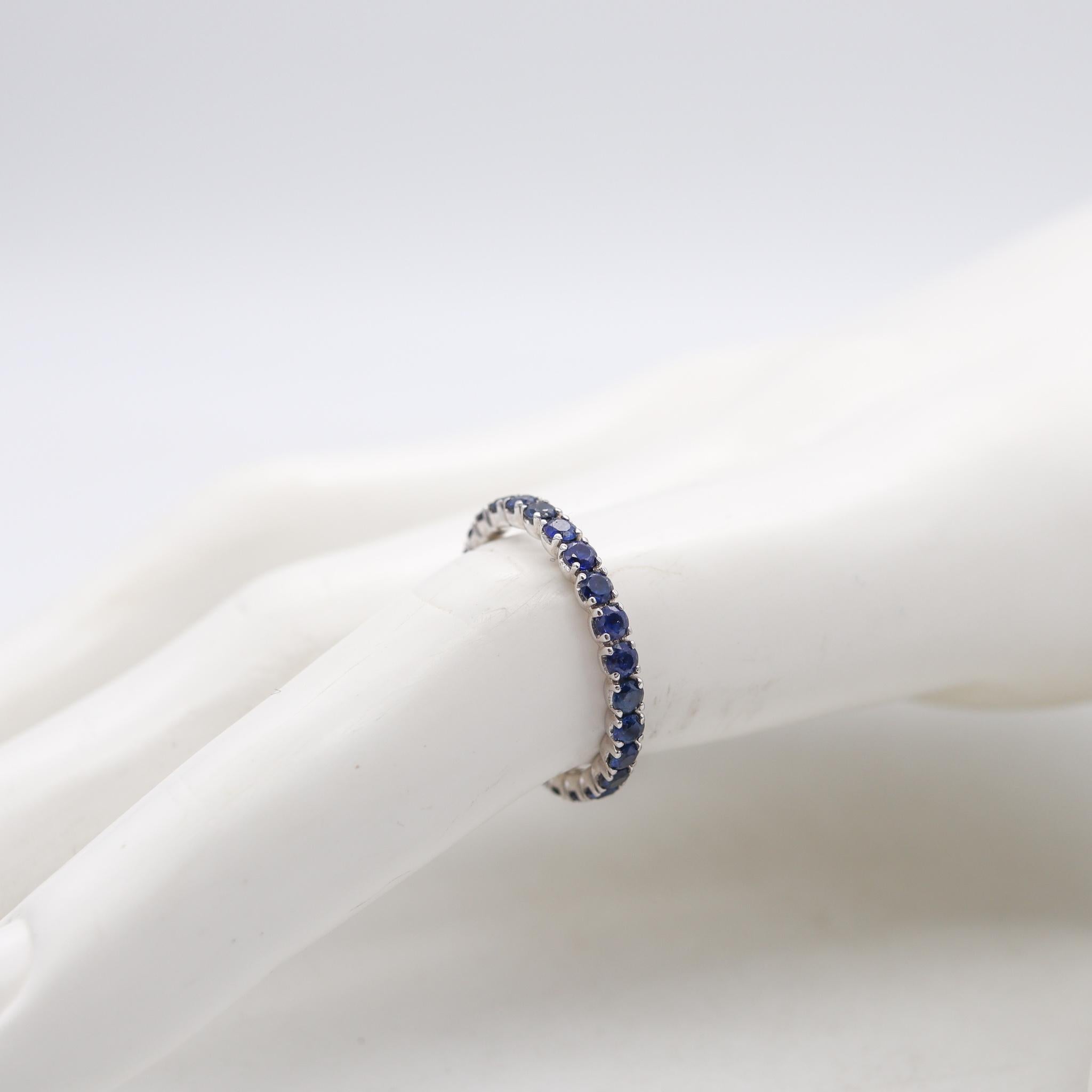 Eternity Ring Band in 18Kt White Gold with 1.25 Carats in Ceylon Blue Sapphires In Excellent Condition For Sale In Miami, FL
