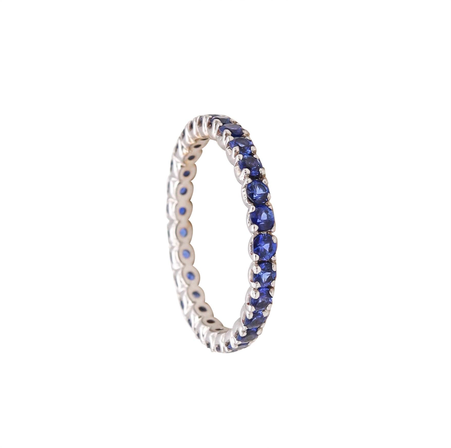 Eternity ring with Blue Sapphires.

Modern full band carefully crafted in solid white gold of 18 karats, with high polished finish. It is mounted in a double row of prongs, with 27 calibrated round brilliant cuts of Ceylon Blue Sapphires

Sapphires: