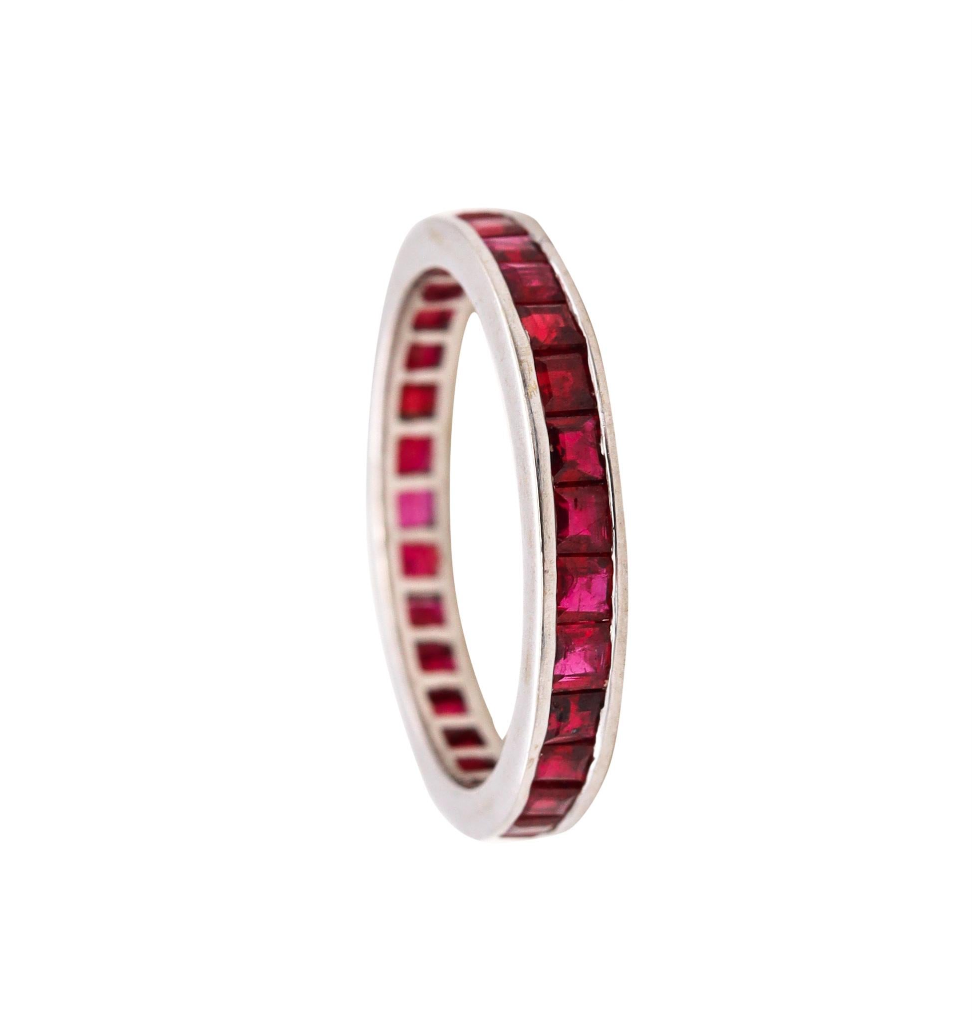 Exceptional eternity ring with Natural Rubies.

Impeccable modern full band carefully crafted in solid white gold of 18 karats, with high polished finish. It is mounted in a channel setting, with 30 calibrated French squared steps cuts of Burmese
