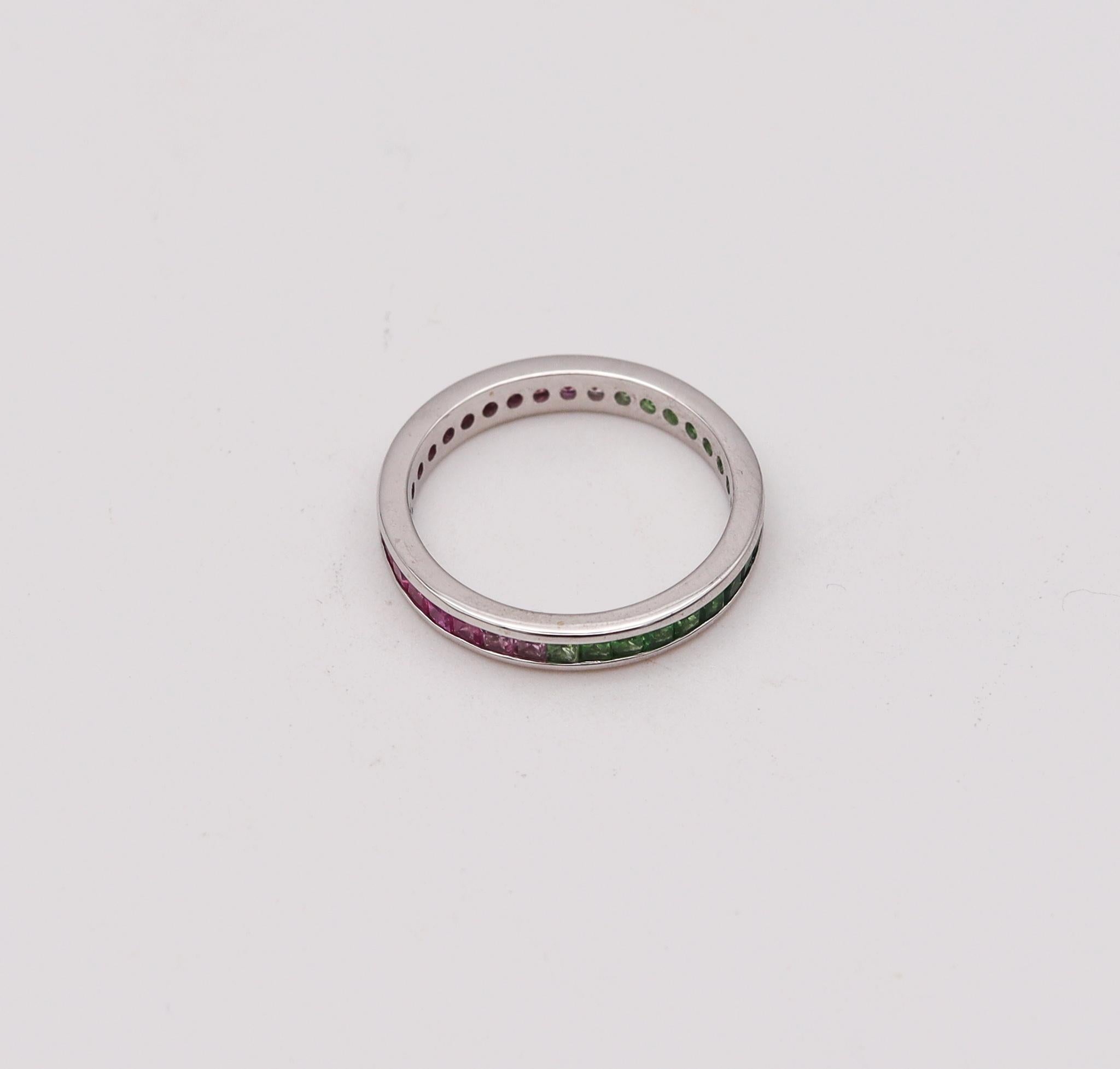 Contemporary Eternity Ring Band in 18kt White Gold with 1.95 Ctw in Green and Pink Sapphires For Sale