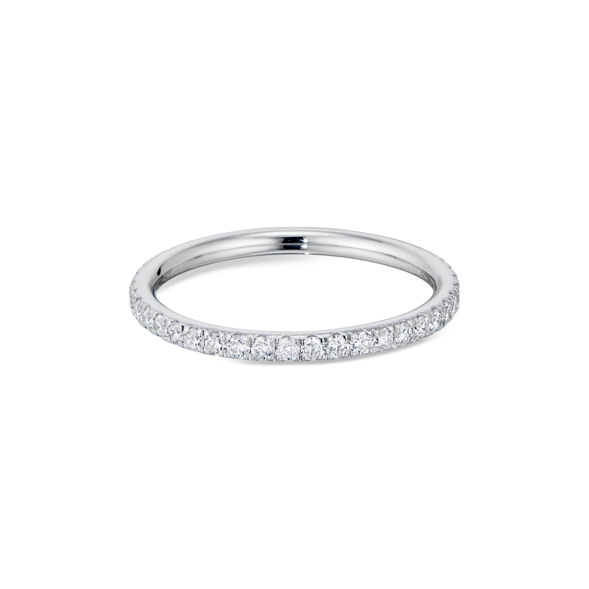 If you’re looking to find the perfect wedding band or simply something to brighten up your ring stack, our Diamond Eternity Band is super versatile. The ring is set with 0.56 carats of round brilliant-cut diamonds and mounted in 18K white gold. It