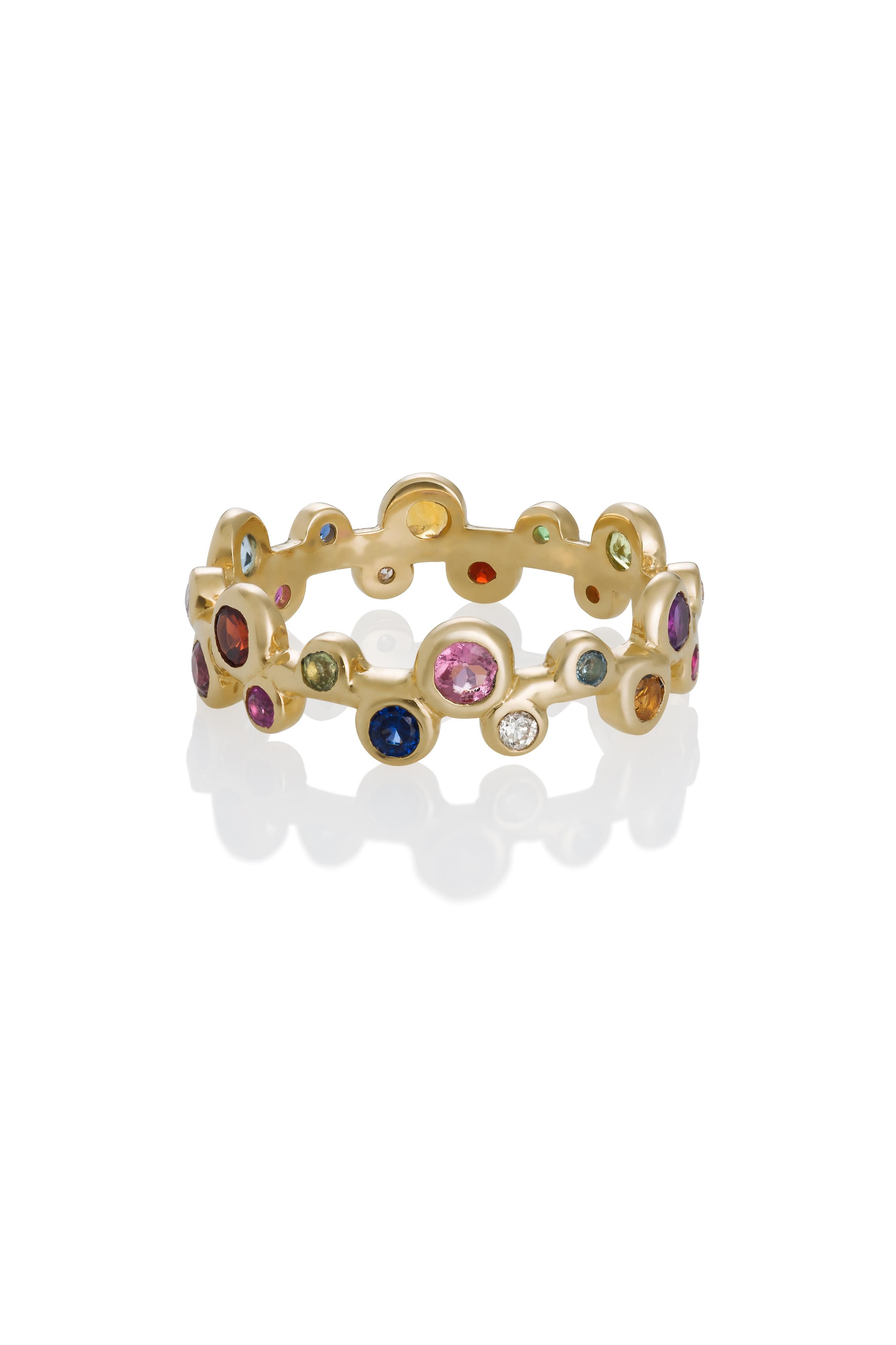  Delicate eternity ring in 14ky, with multi-color gemstones and diamonds. (0.72 carats) is a lovely stacking ring or wedding ring. This one is a size 7.  It has diamonds, pink sapphires, citrine, garnets, topaz, tourmaline, peridot and