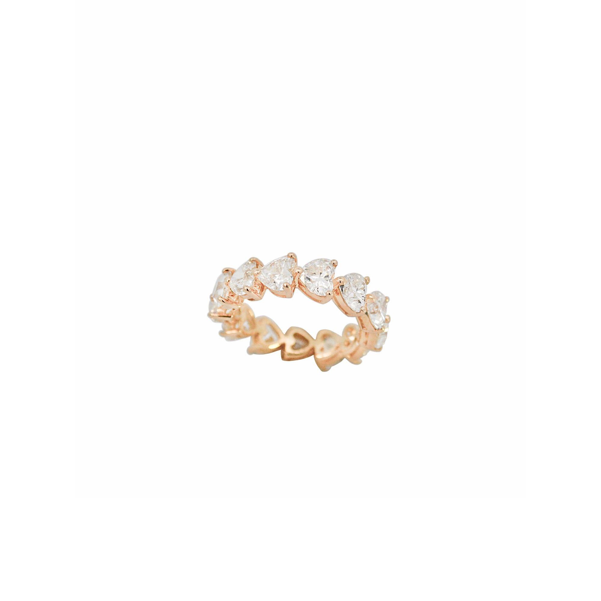This sparkling eternity band will always be magical! Features 6.65ct heart-cut diamonds set in 18K yellow gold.

Additional information:
Metal: 18K Gold: 3.32gr
Stone: Diamonds: 6.65ct
Clarity: VS1 - SI1
Color: G - H
With natural inclusions,