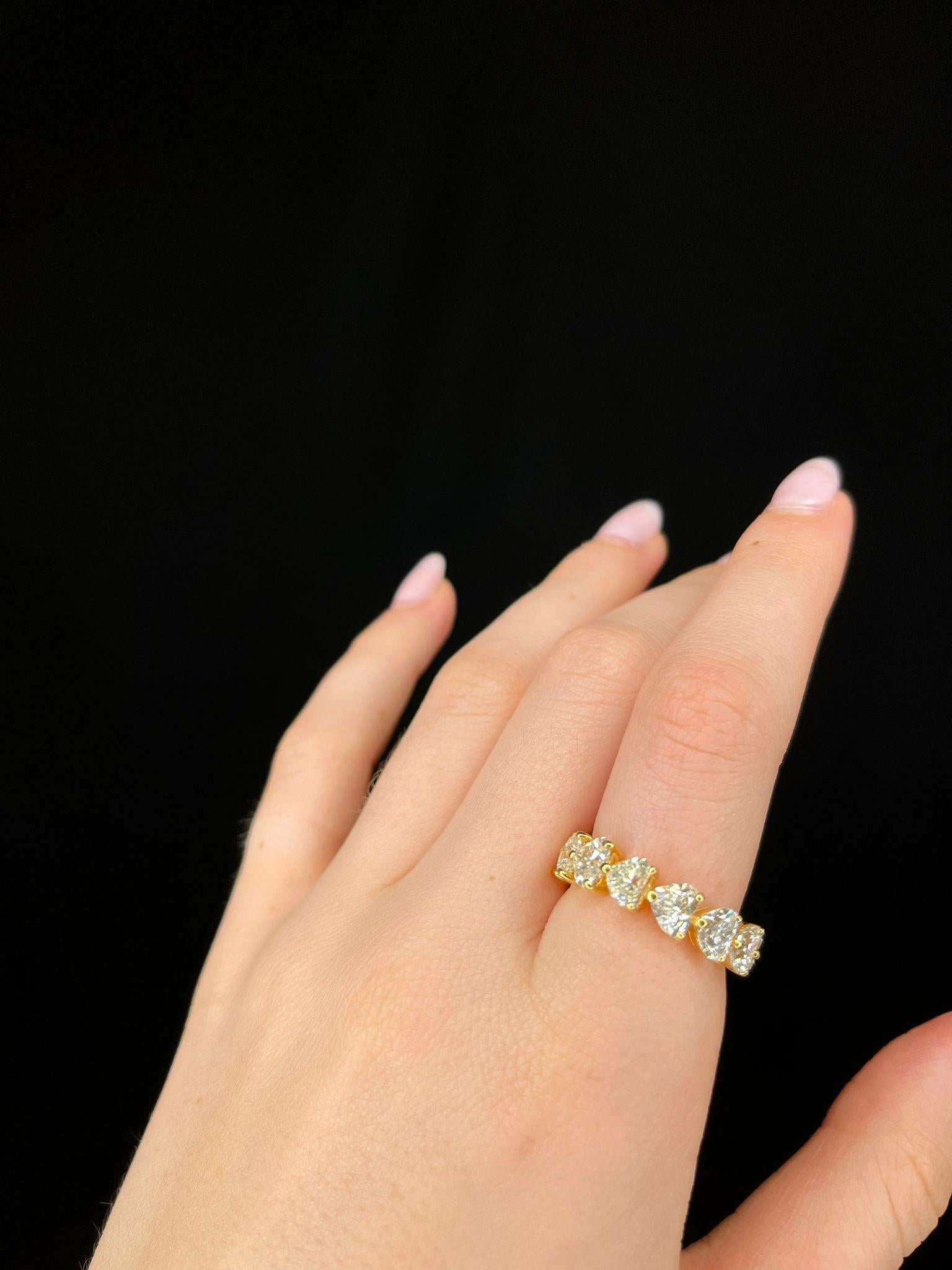 Contemporary Eternity Ring in 18k Yellow Gold with 6.65 Carat Heart Cut Diamond For Sale