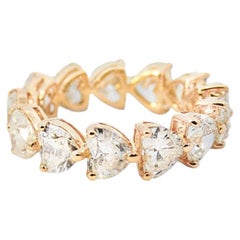 Eternity Ring in 18k Yellow Gold with 6.65 Carat Heart Cut Diamond