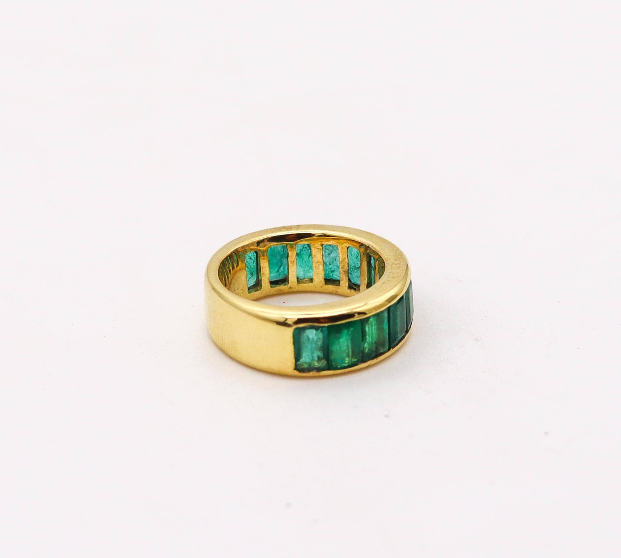 Emerald Cut Eternity Ring in Solid 18 Karat Yellow Gold with 6.06 Ctw of Natural Emeralds For Sale