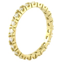 Eternity ring with brilliant cut diamonds up to 0.65ct 18k yellow gold
