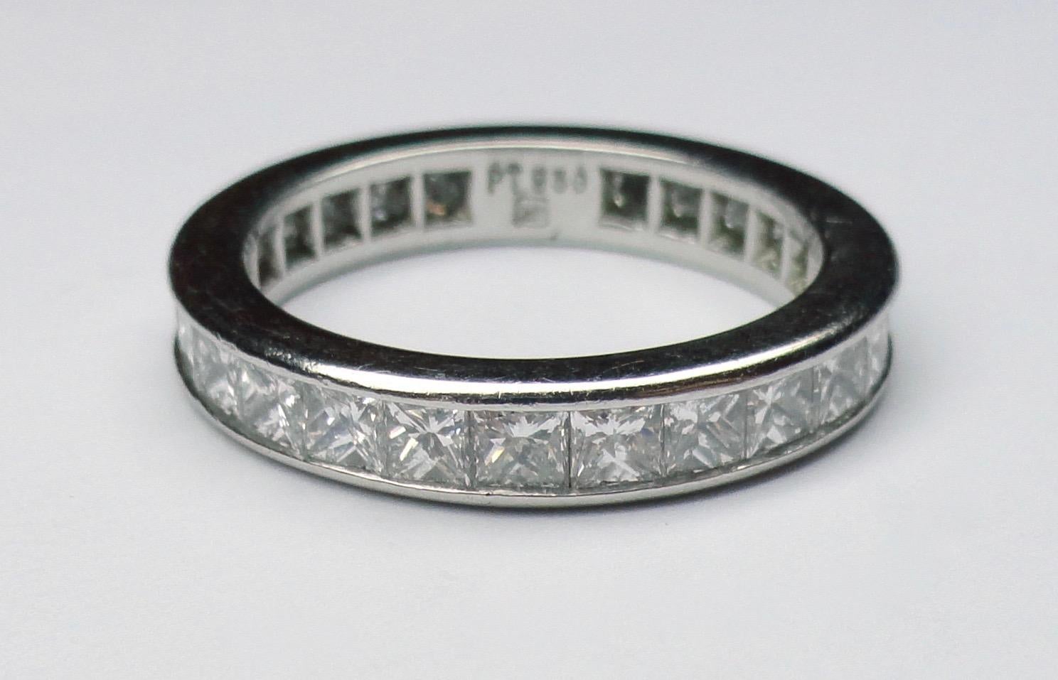 Eternity ring with princess cut diamonds with a total diamond weight of 2 carats c.a., mounted in platinum.