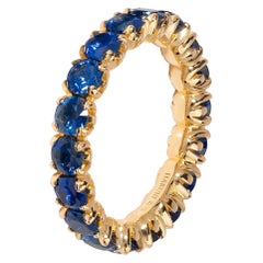 Eternity Ring With Royal Blue Sapphires in 18 Karat Yellow Gold