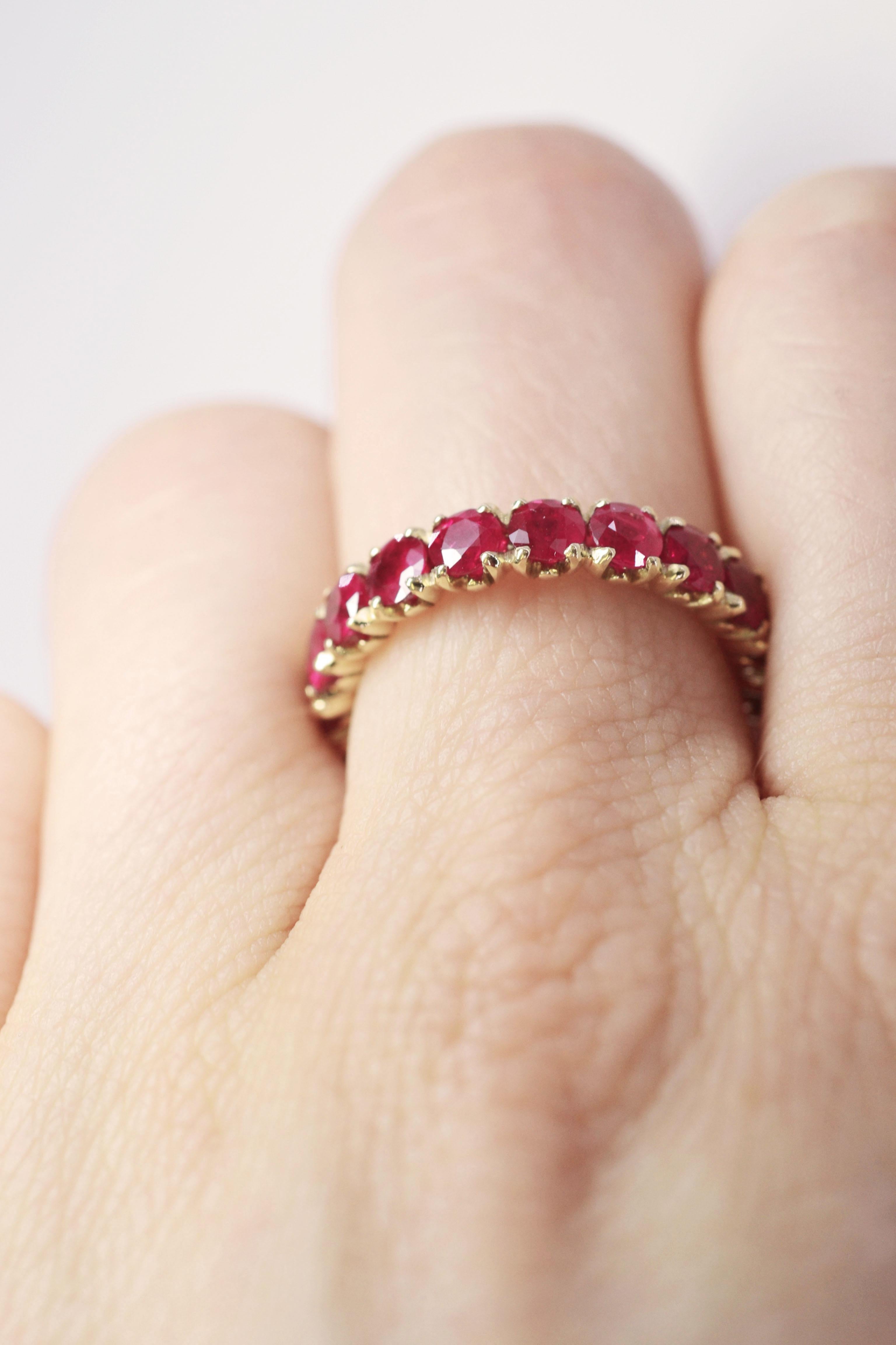 Contemporary Eternity Ring with Rubies in 18 Karat Yellow Gold For Sale