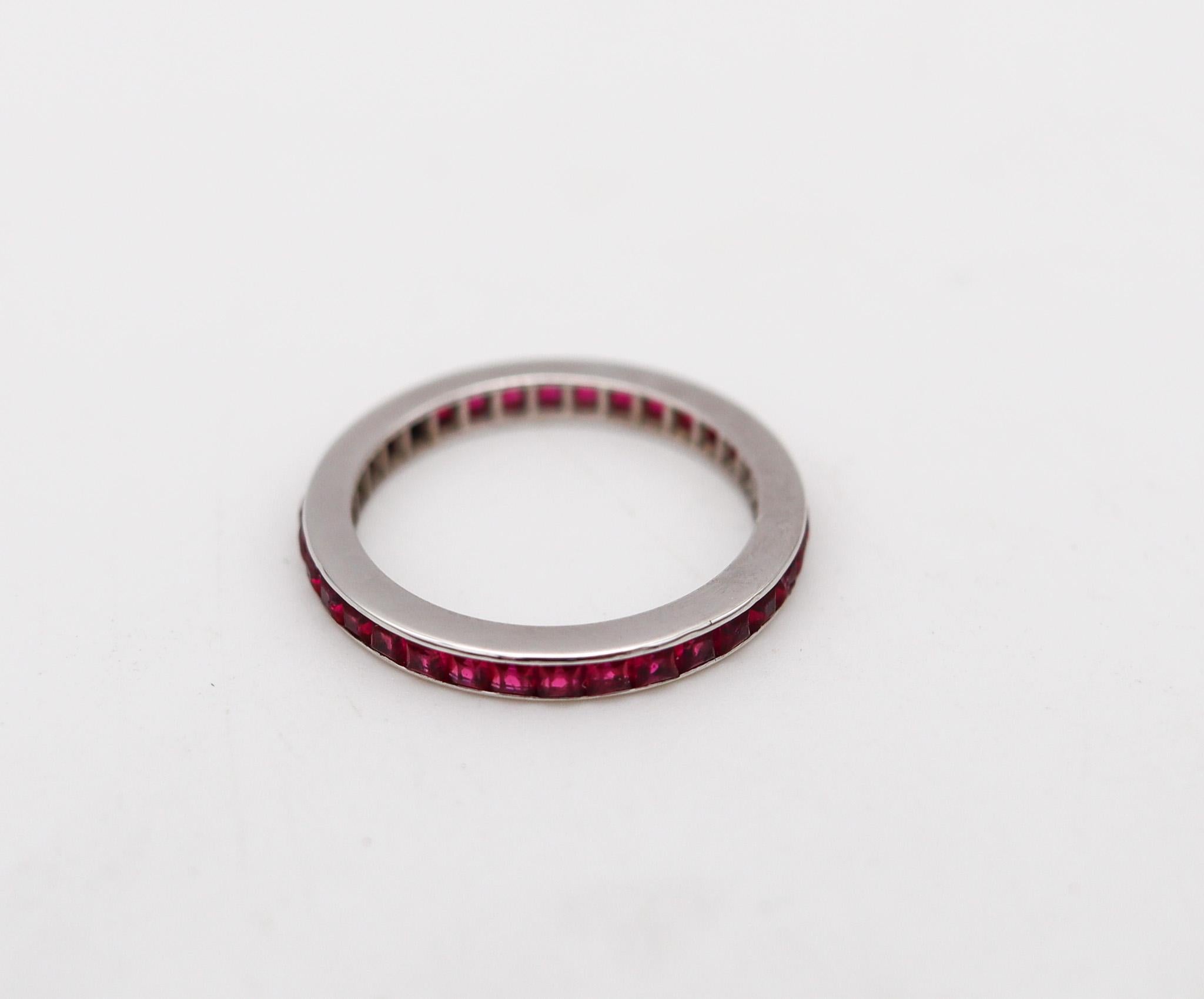 A suite of two eternity bands with rubies.

Beautiful matching pair (2) of eternity bands rings crafted in solid white gold of 18 karats, with high polished finish. Recently polished and finished with rhodium plating.

Rubies: Mount in a channel