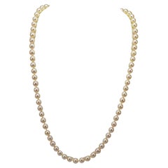 Collier d'éternité en perles blanches lustrées