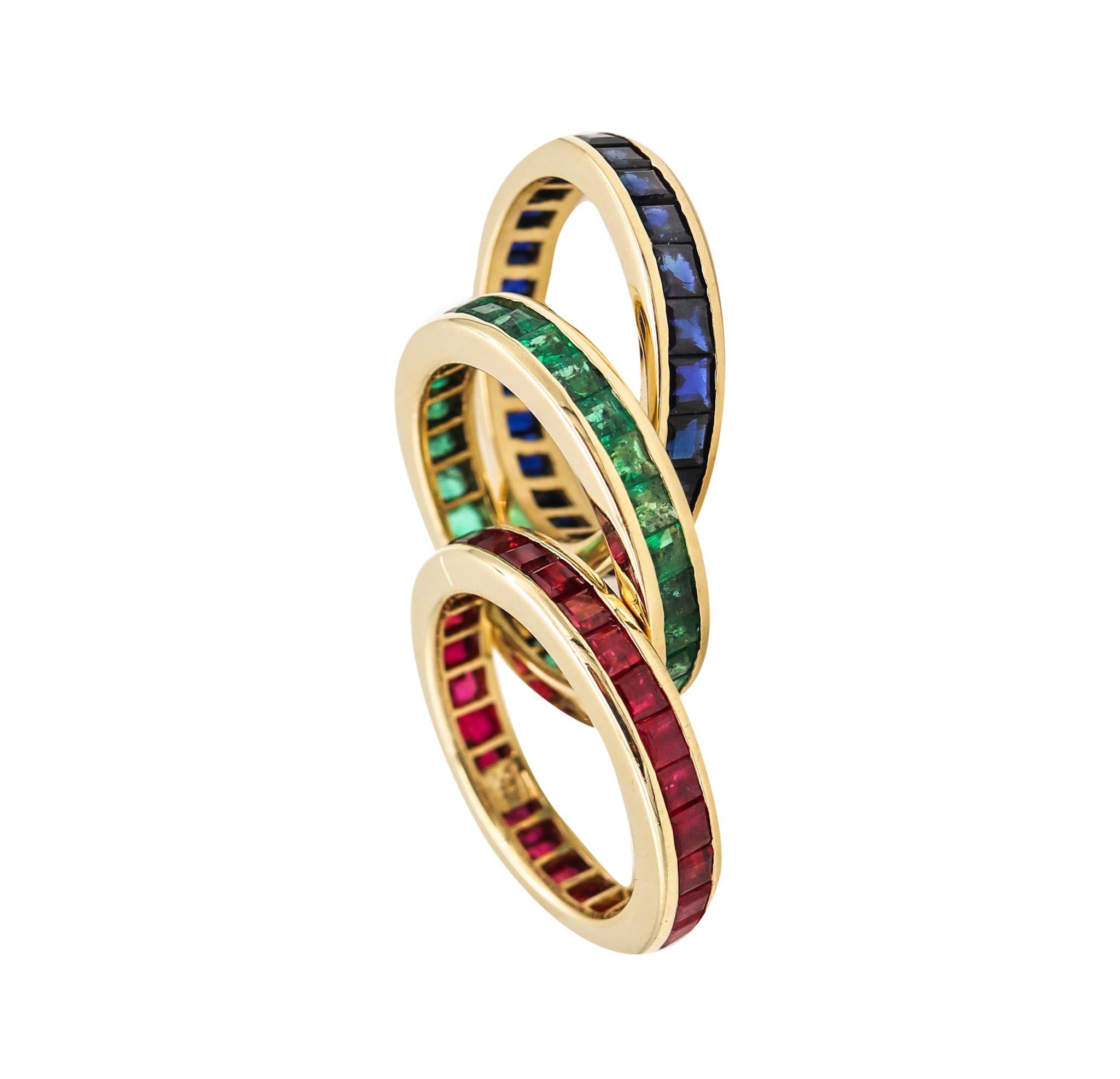 A suite of three eternity bands with gemstones.

Beautiful matching trio of eternity bands rings, crafted in solid yellow gold of 14 karats, with high polished finish. They are channel-set with 89 calibrated square faceted cut of natural colorful