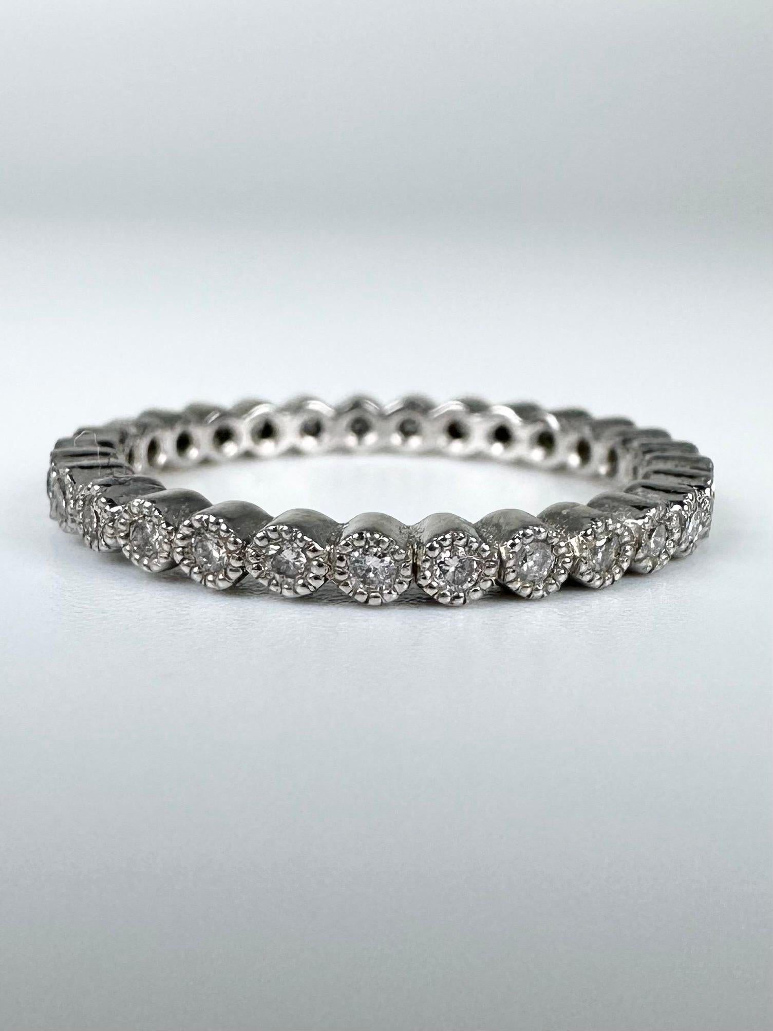 Eternity diamond ring made with hand finish design called milgrain around every diamond, the ring is performed in 14KT white gold and cannot be resized.
GOLD: 14KT gold
NATURAL DIAMOND(S)
Clarity/Color: VS/G
Carat:0.29ct
Cut:Round