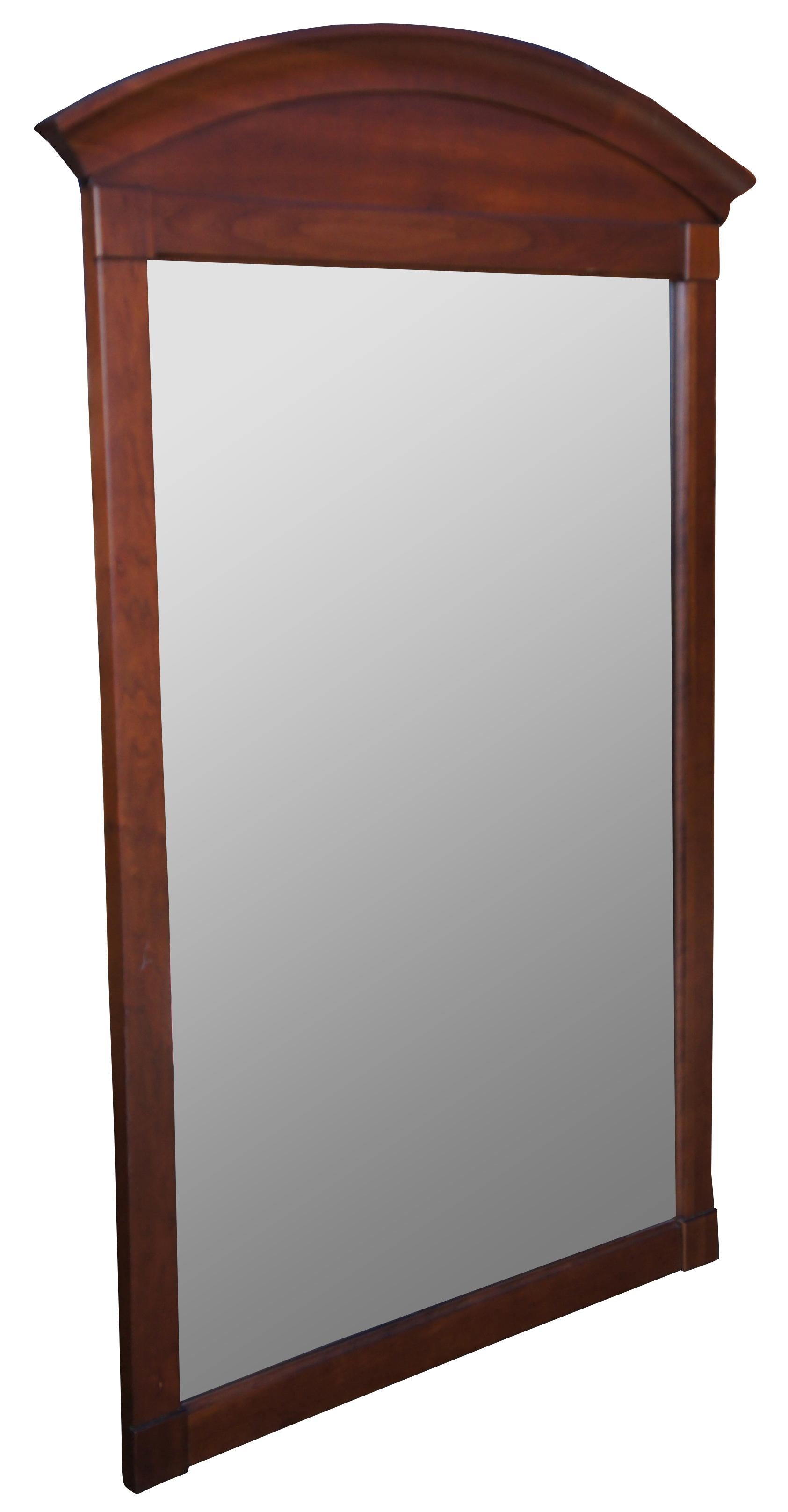 Vintage Ethan Allen American Impressions mirror. Made of cherry featuring traditional styling with an arched or domed top and beveled mirror. #24-5410, made in March of 1993.
 