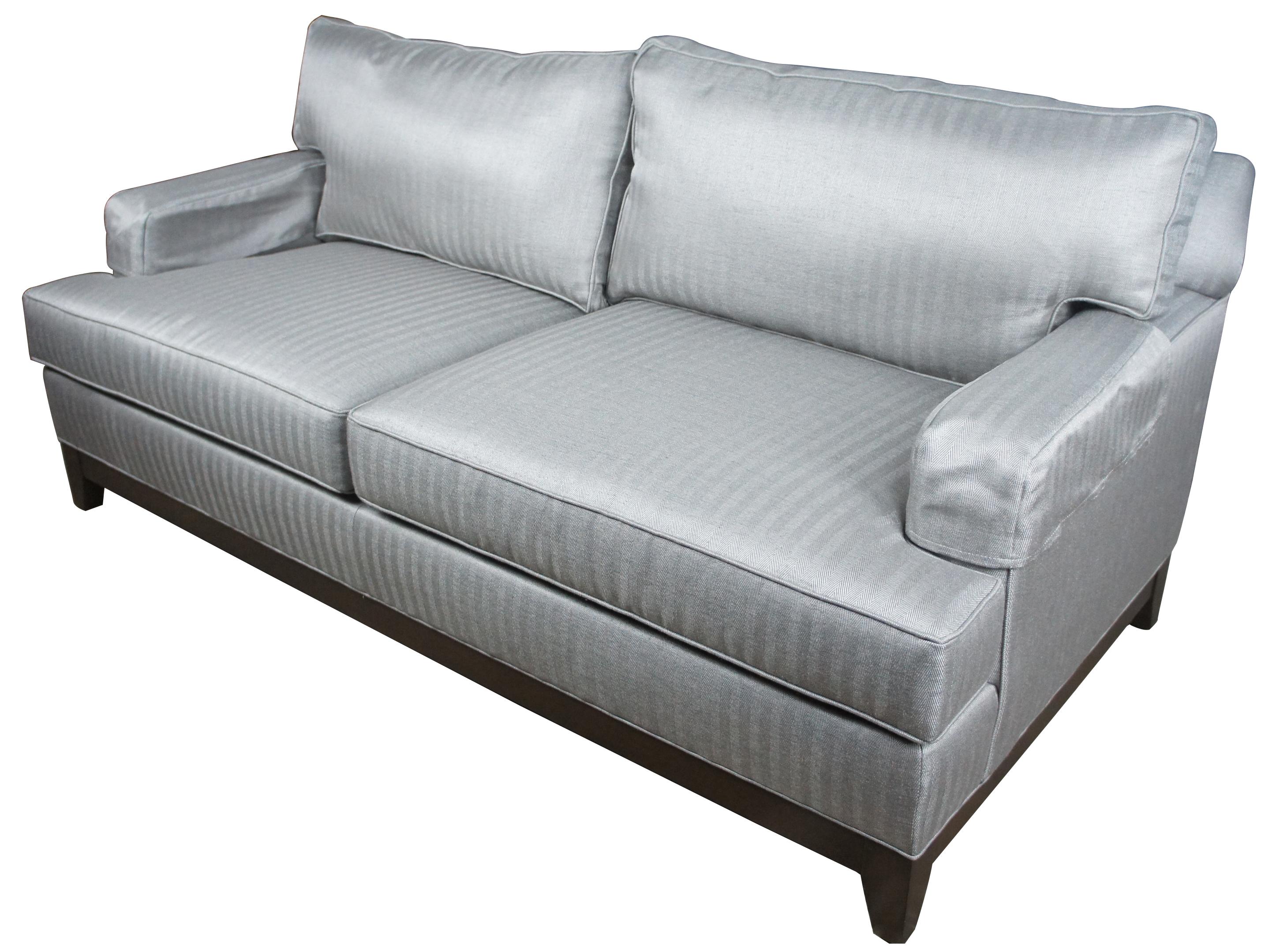 Ethan Allen Arcata two-seat sofa Gray Herringbone Contemporary 20-2114

Comfort abounds in this perfectly scaled, contemporary seating collection. A signature wood base with tapered legs anchors loose back and seat cushions and track arms, making