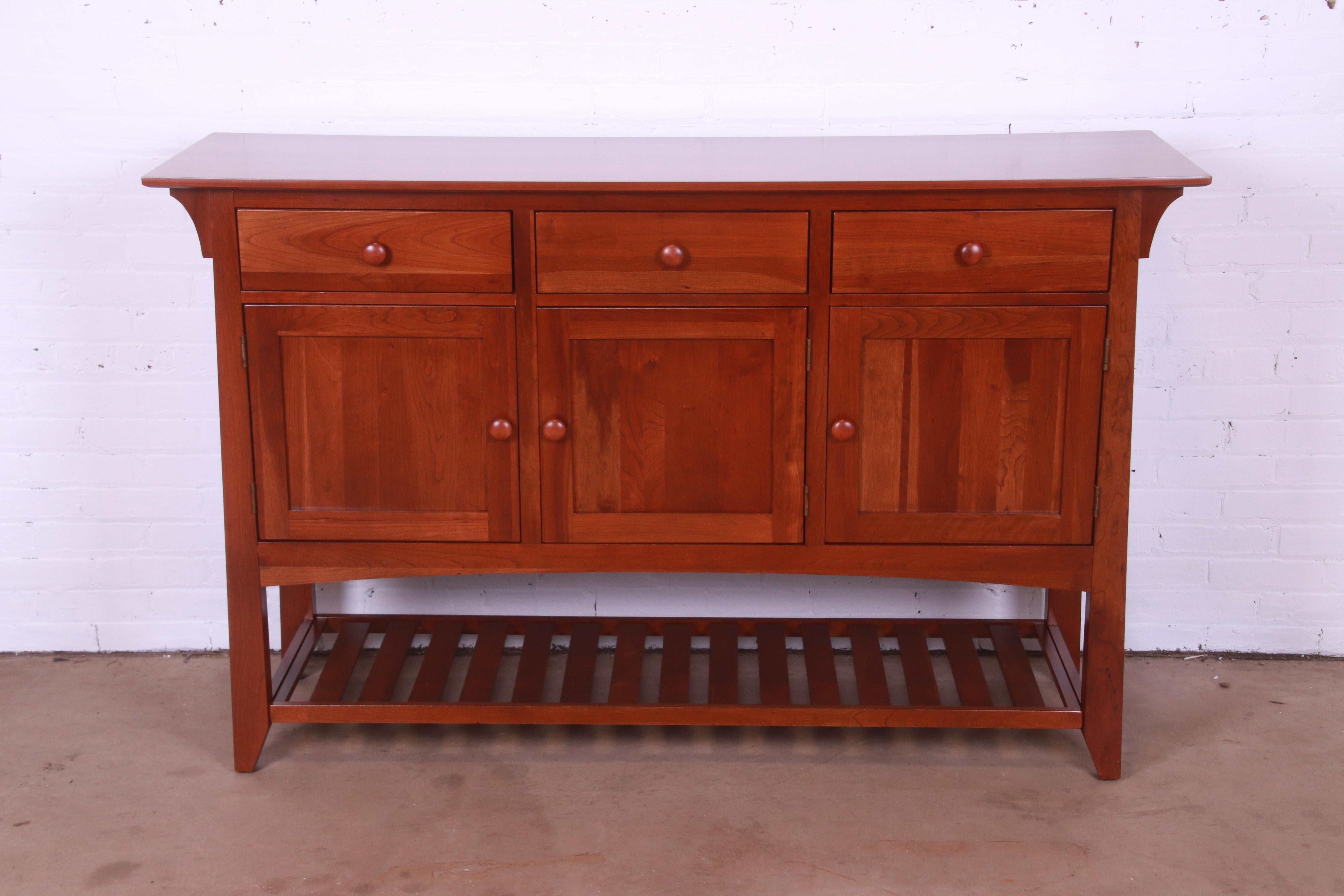 A gorgeous Arts & Crafts or Shaker style cherry wood sideboard, credenza, or bar cabinet

By Ethan Allen, 