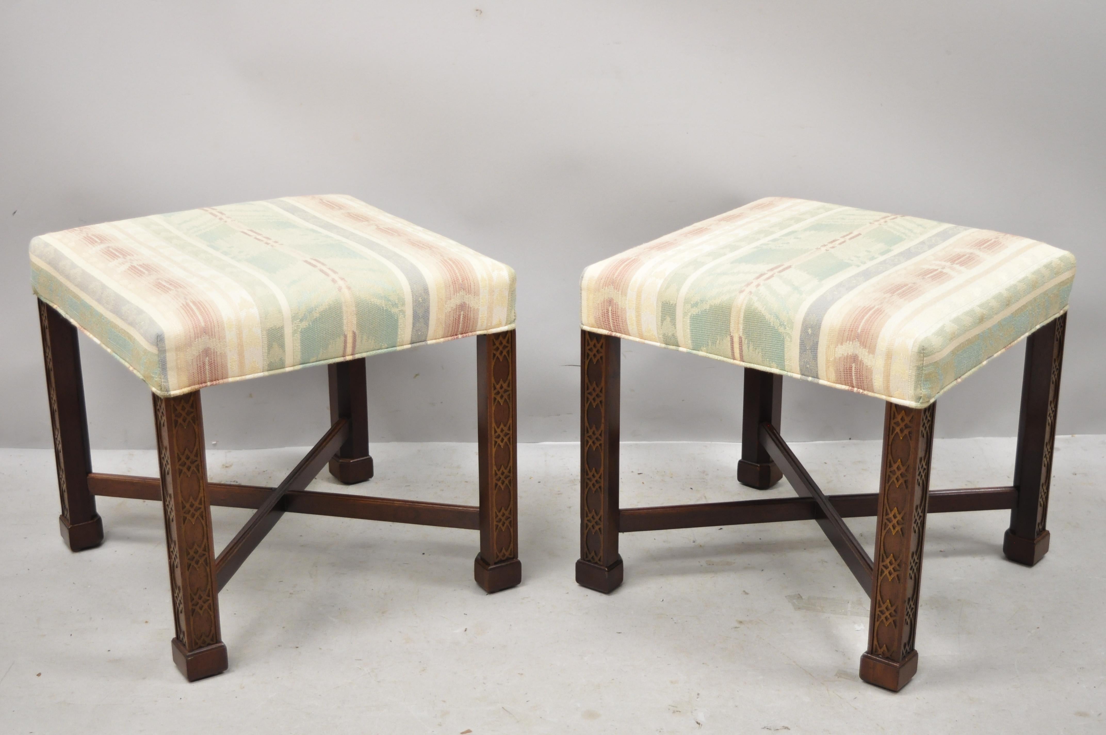 20th century Ethan Allen Chinese Chippendale style mahogany fretwork square stool - a pair. Item features a solid wood frame, upholstered seat, nicely carved details, quality American craftsmanship, great style and form, circa late 20th century.