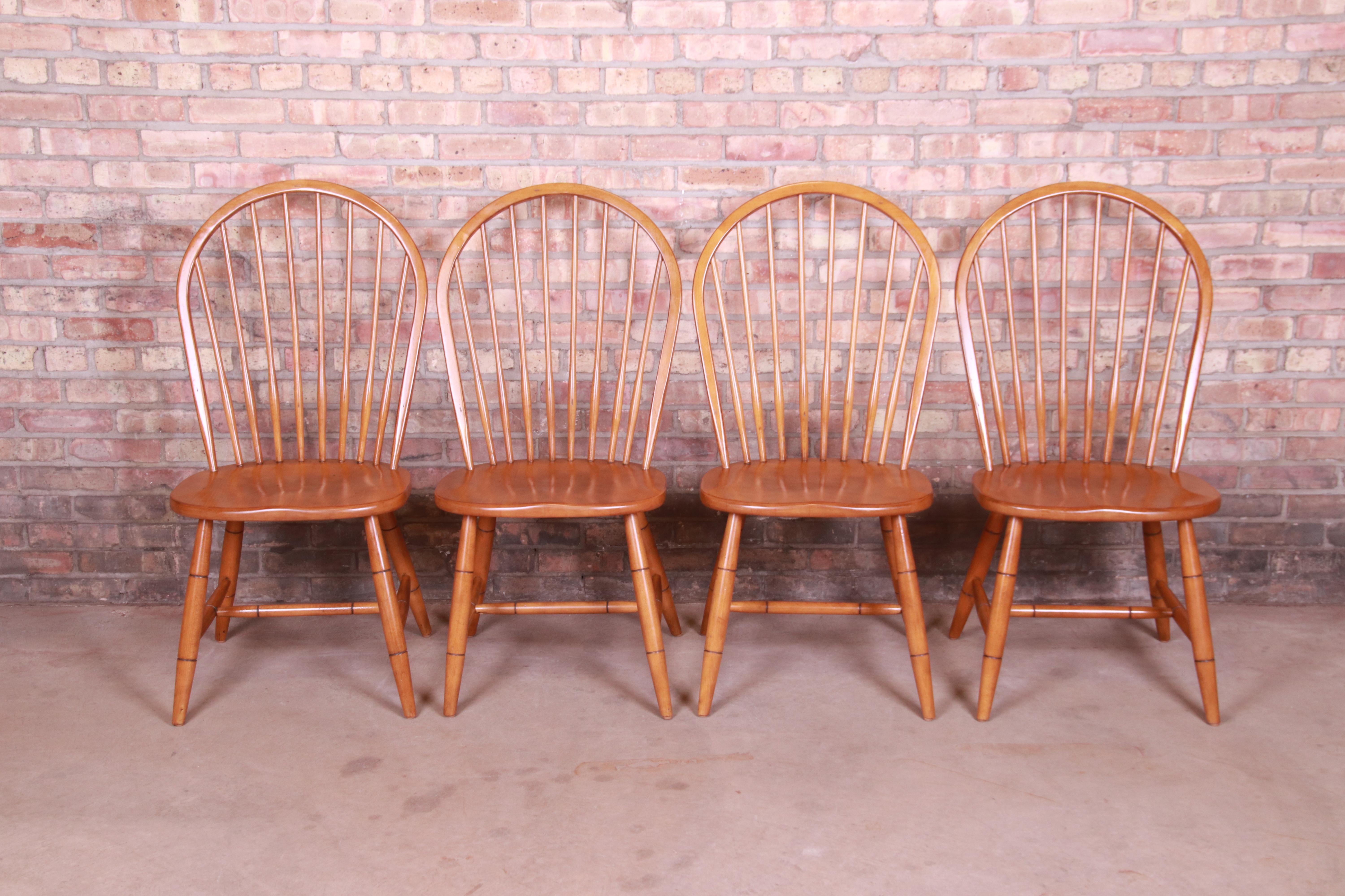A gorgeous set of four spindle back maple dining chairs

By Ethan Allen,

circa 1980s

Measures: 20.75