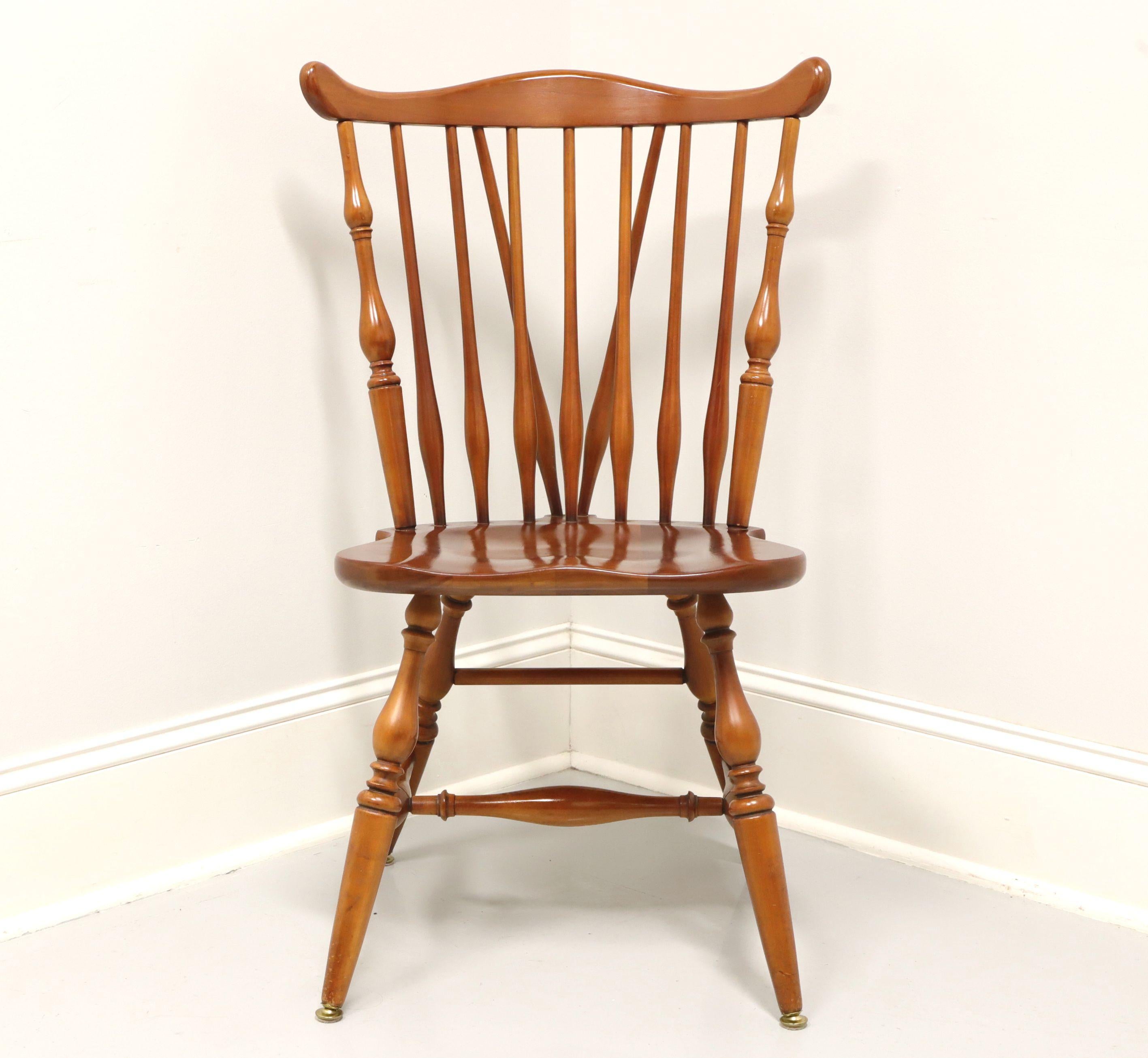 A Windsor style dining side chair by Ethan Allen, their Duxbury. Solid maple, fiddleback with turned side spindles, saddle shape seat, tail-supports with spindles, turned legs and stretchers. Made in the USA, in the mid 20th Century.

Style #: